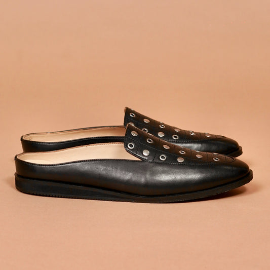 Side view of Hoffler Nero Riveto leather backless ethnic shoe