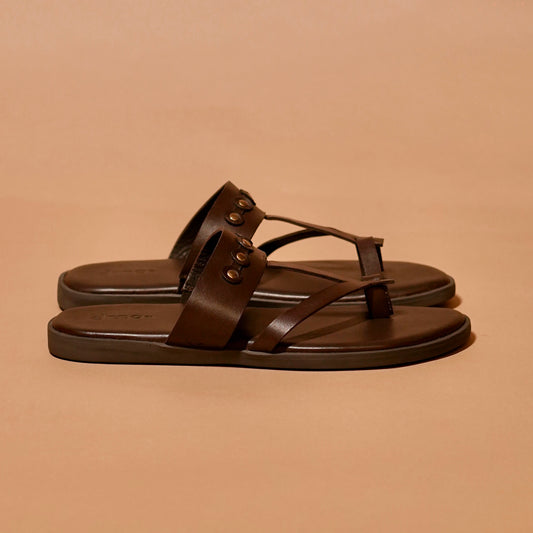 Side view of espresso brown open-toe slider with stud detailing
