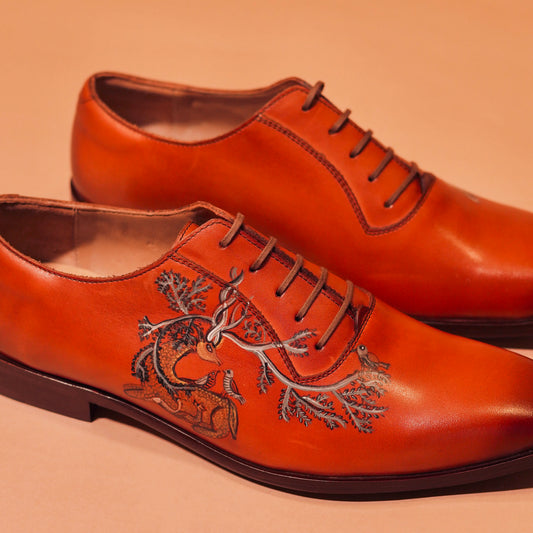 Close-up of Gond painting details on Bruno Pituro shoe