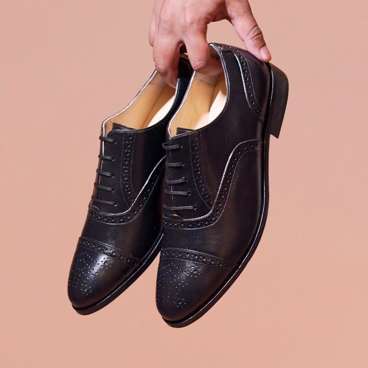 Classic black cap-toe Oxford