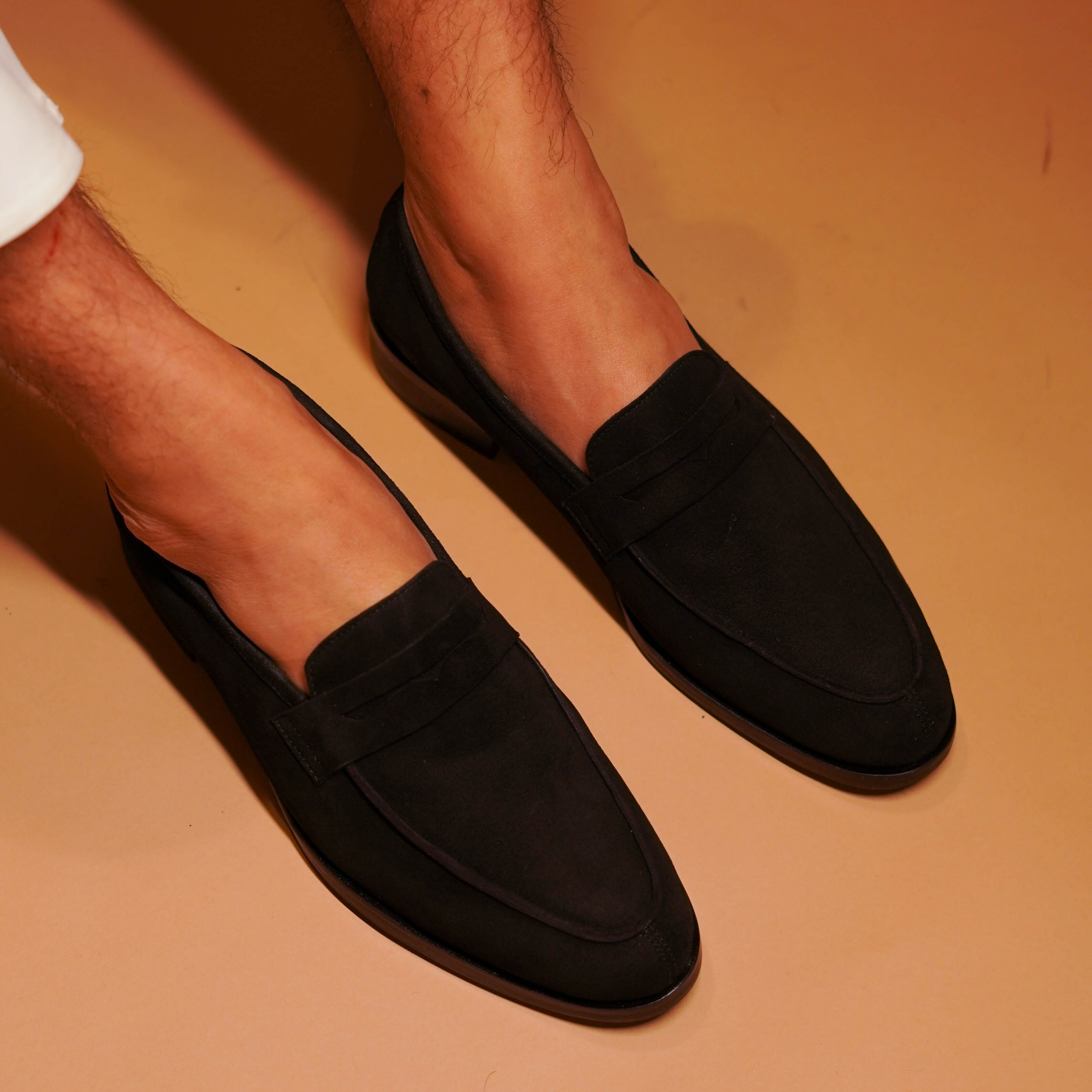 Nero | Classic black suede penny loafers