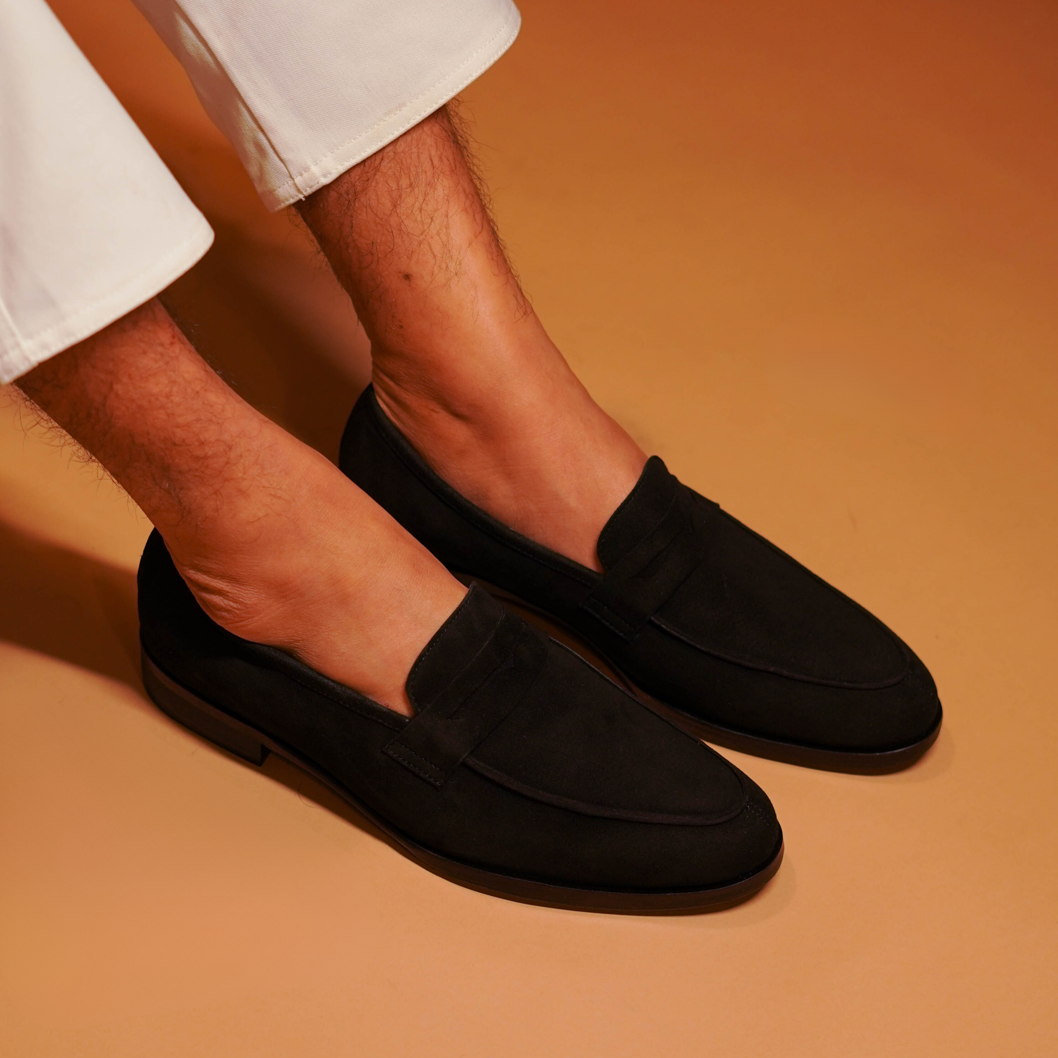 Nero | Classic black suede penny loafers