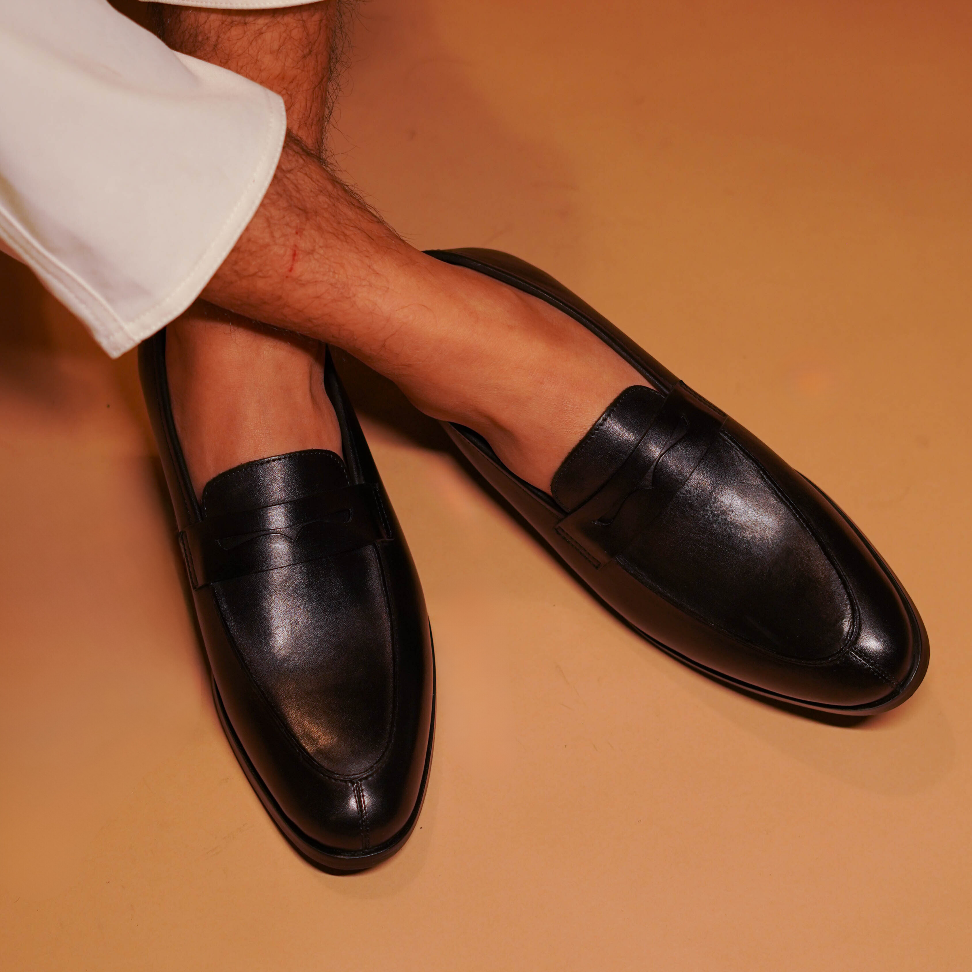 Noir | Classic black leather penny loafers