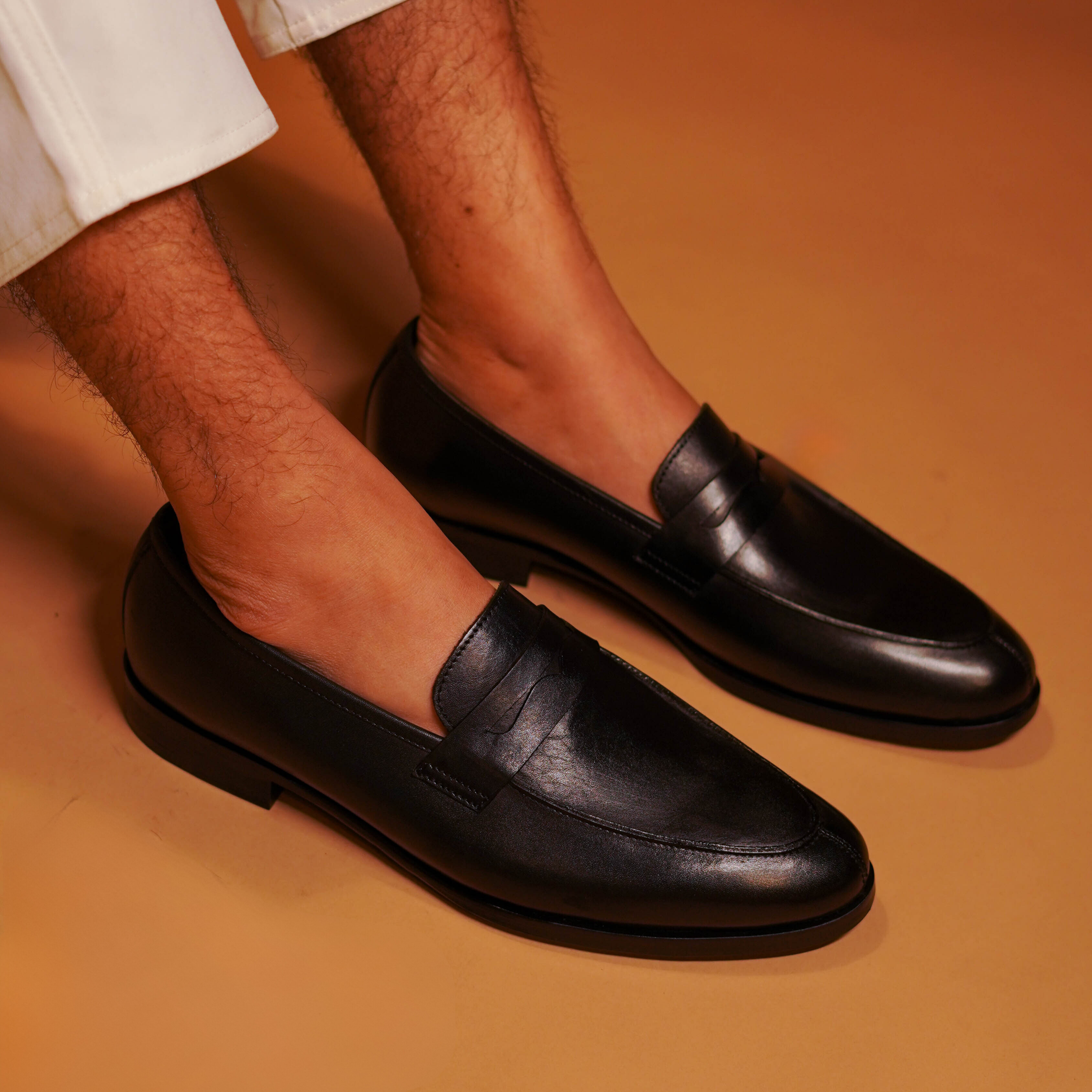 Noir | Classic black leather penny loafers