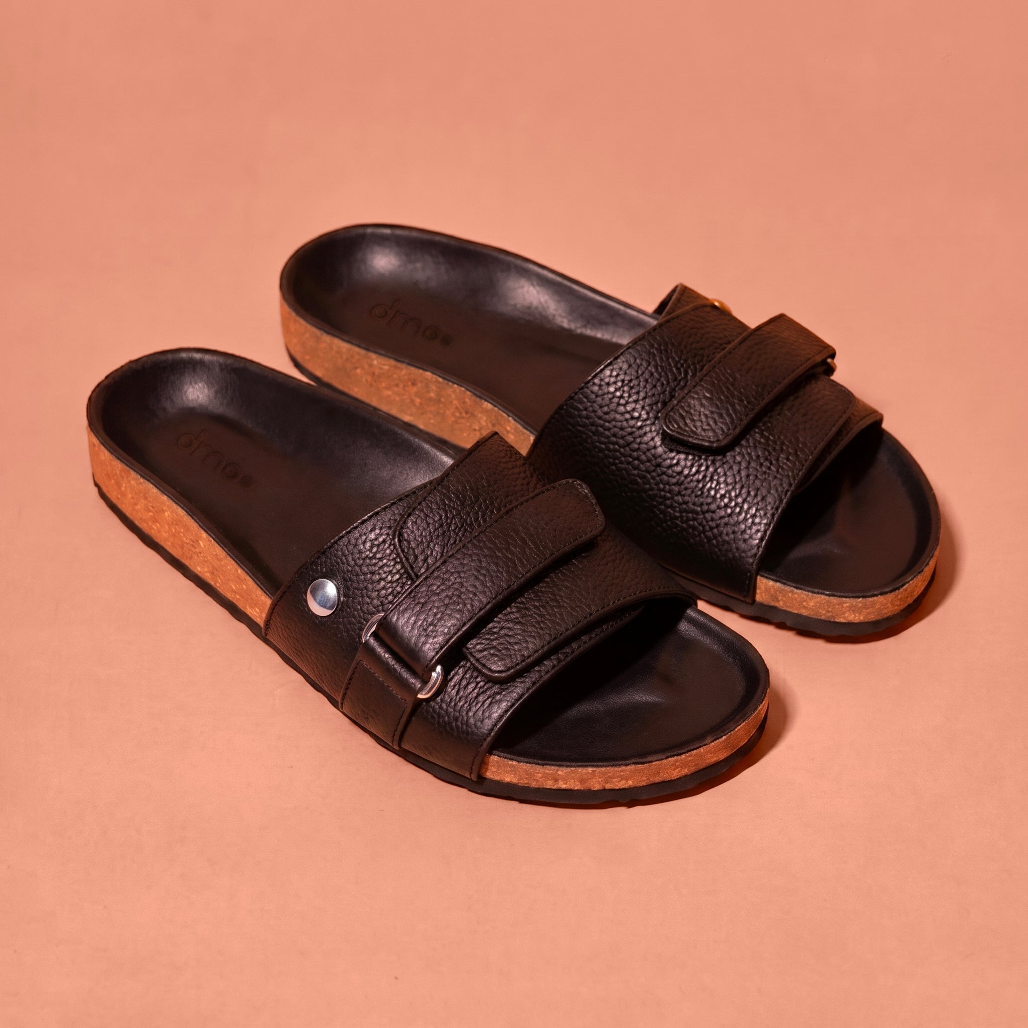 Corko Nero Scuro black slide sandal for men styled for casual wear