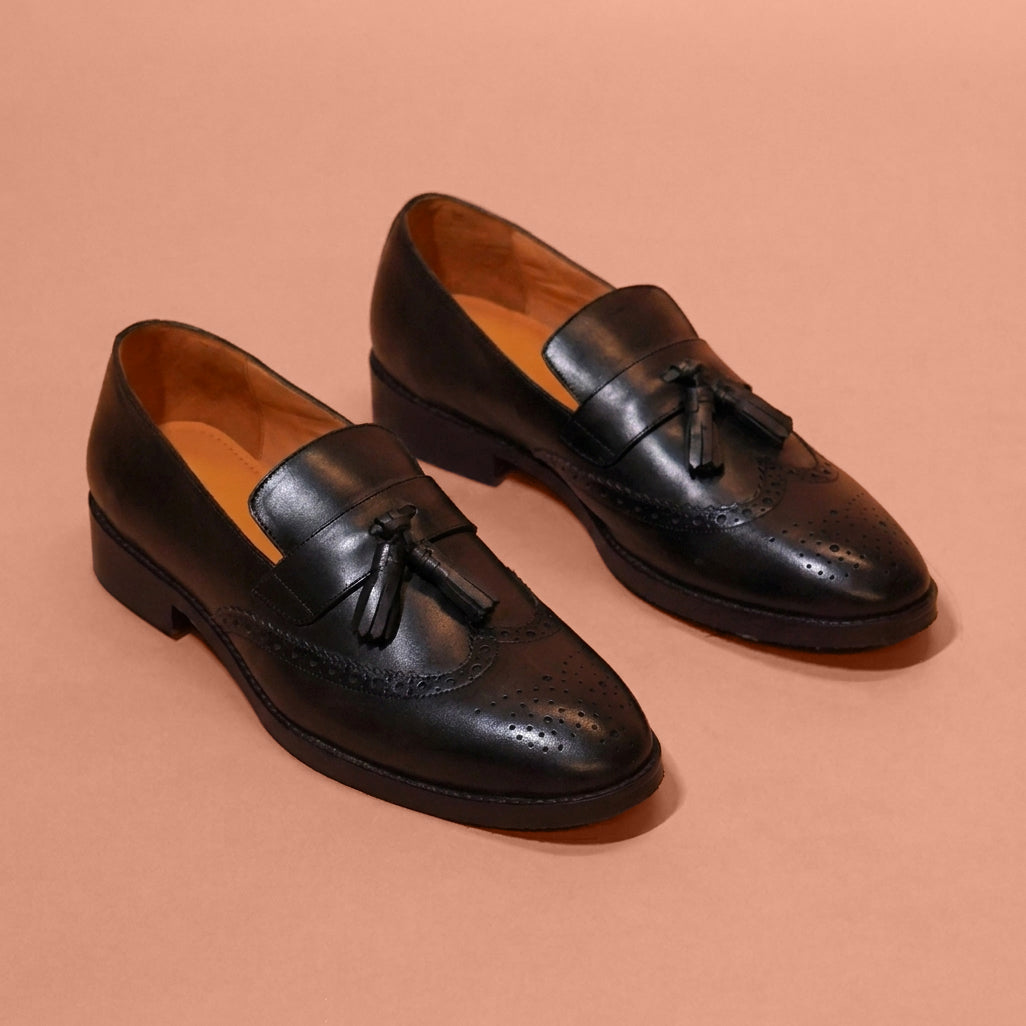 Men's black leather formal loafer styled for occasion wear