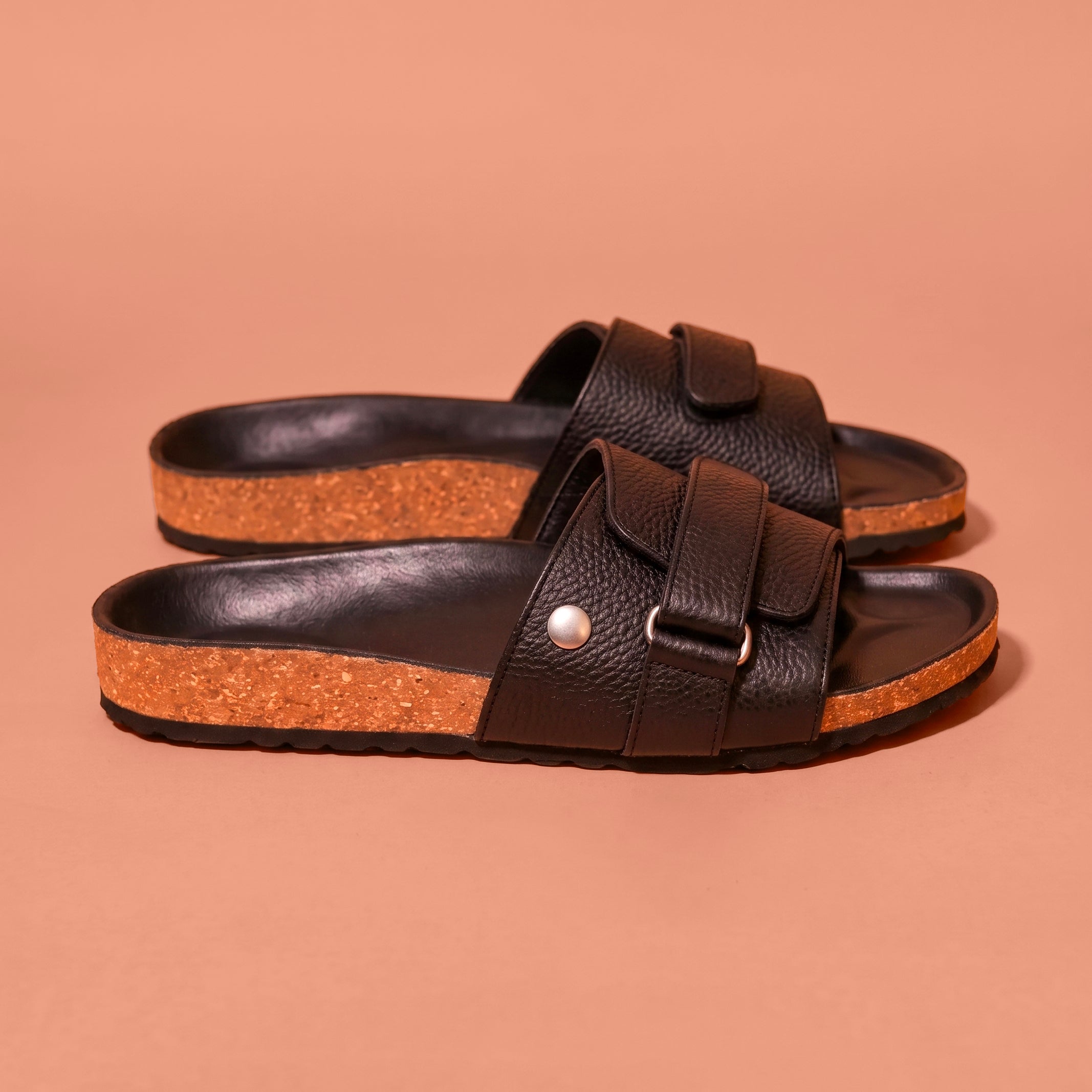 Corko Nero Scuro black pebbled leather sandal with silver rivet detailing