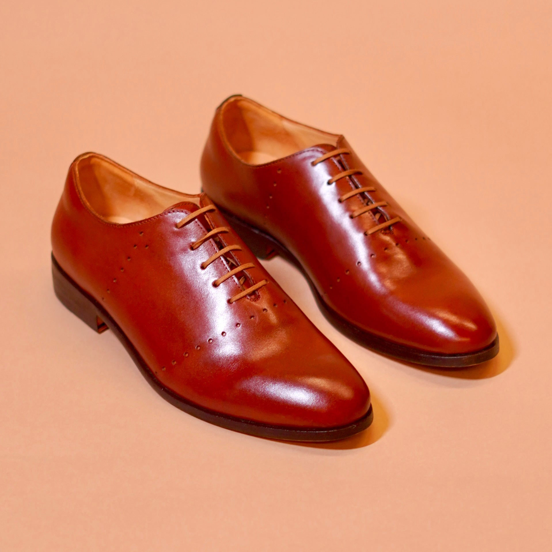 Netto | Dark Tan leather Oxfords with minimal detail