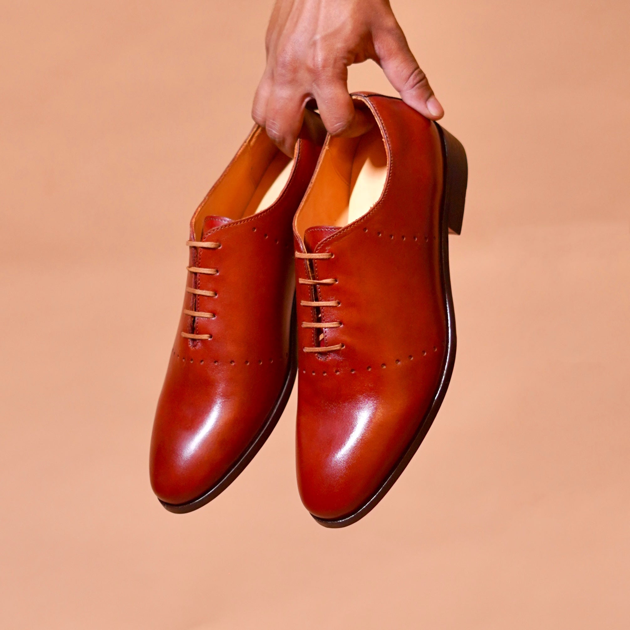 Netto | Dark Tan leather Oxfords with minimal detail