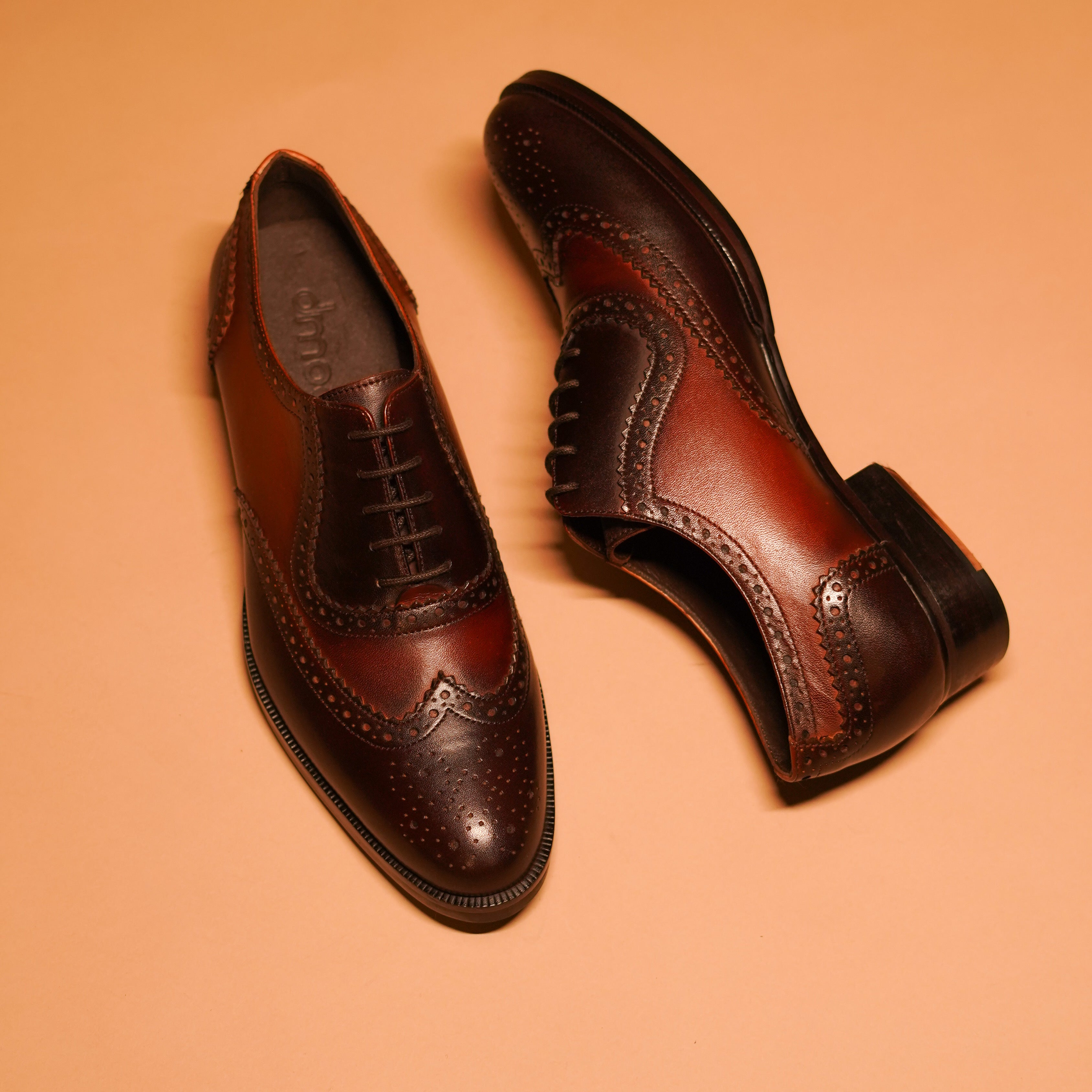 Classico Bruno dual-tone wingtip brogue Oxford in light and dark brown full-grain leather.