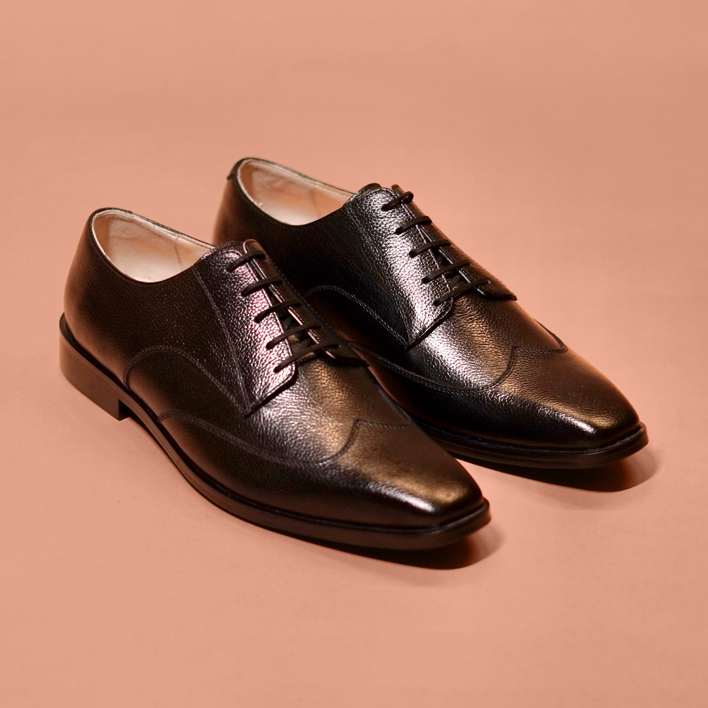 Carbo Nero | Black milled leather wingtip Derbys