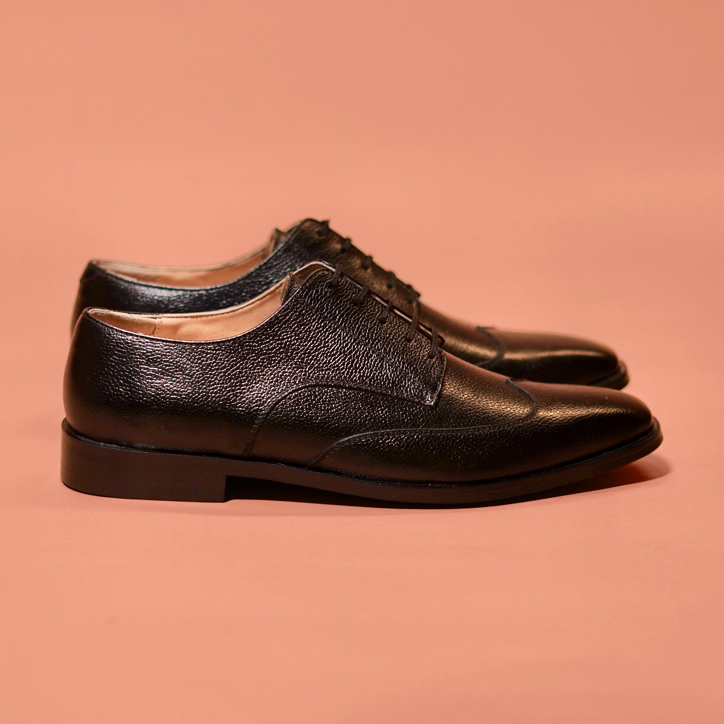 Carbo Nero | Black milled leather wingtip Derbys