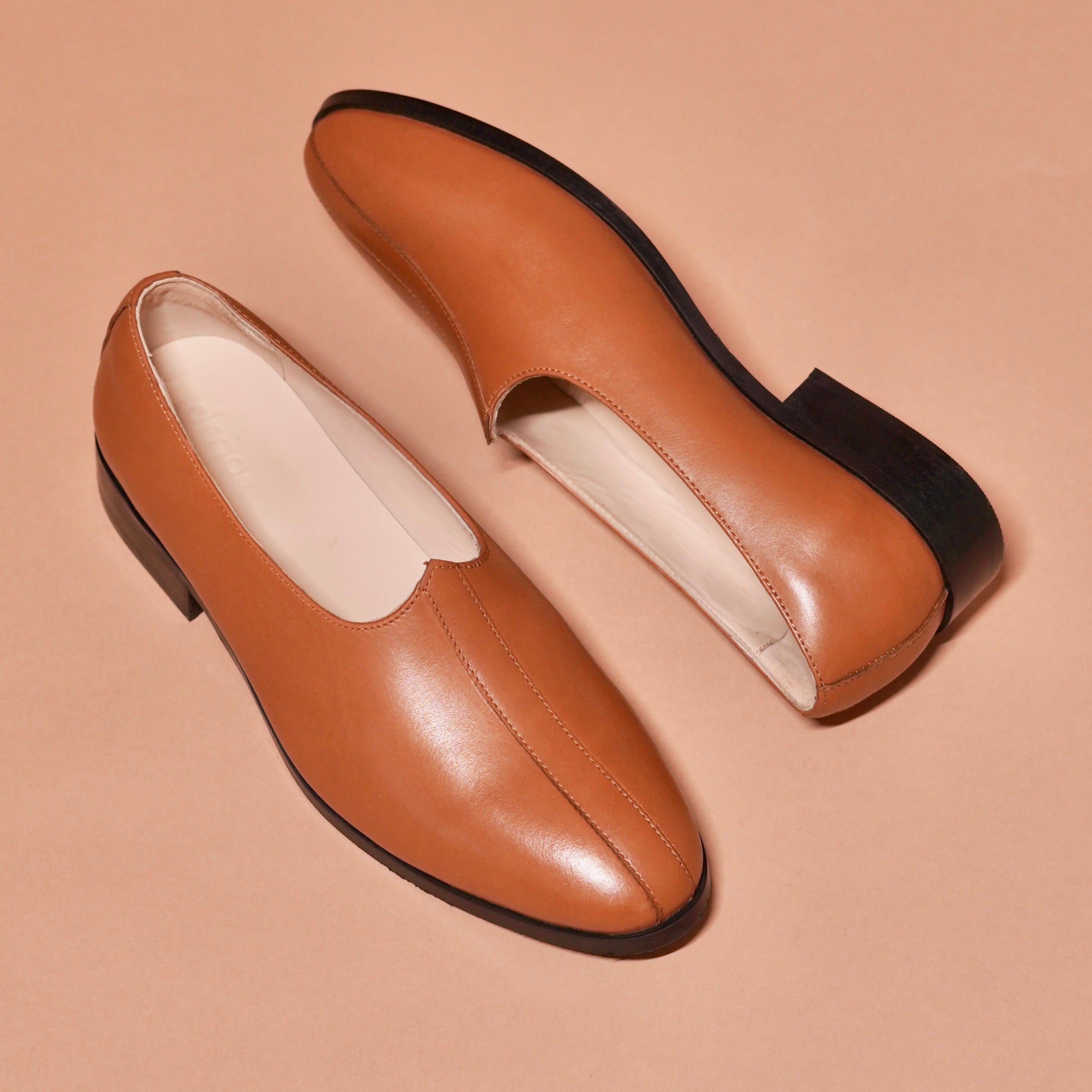 Detail of handcrafted stitching on Ethnico Cacao Mojari