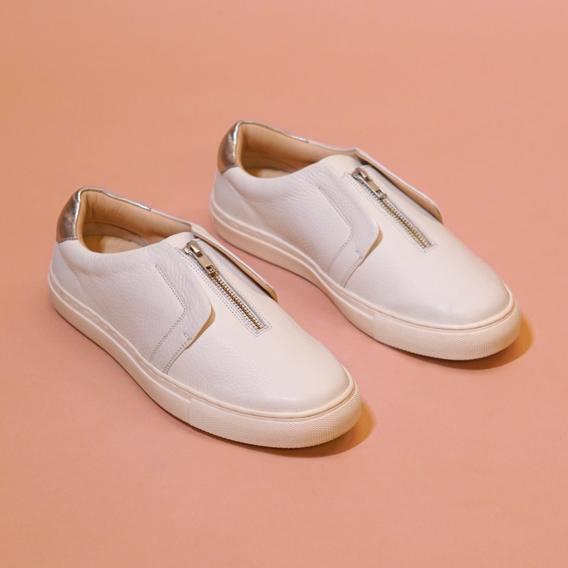 Pigro Bianco | White zip-up leather sneakers