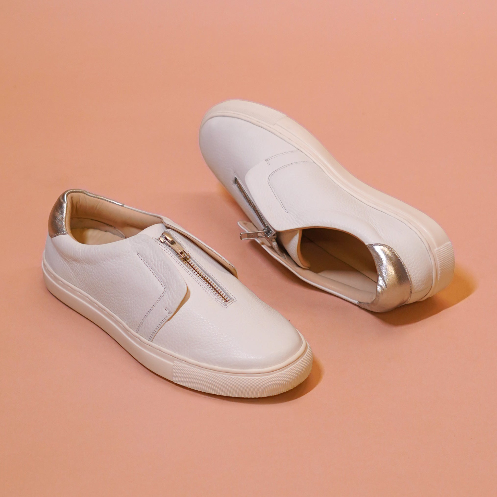 Pigro Bianco | White zip-up leather sneakers