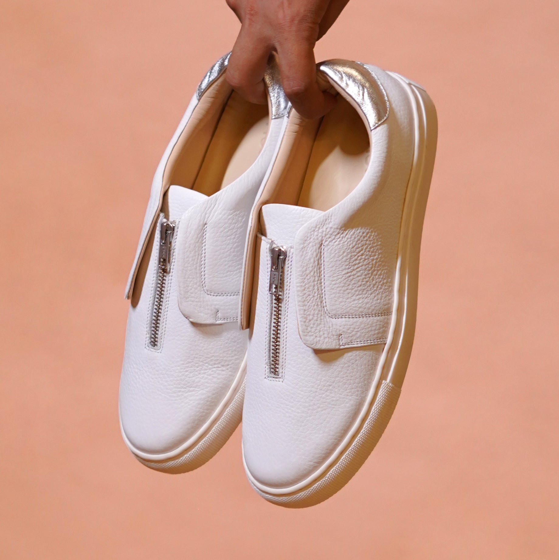 Pigro Bianco | White zip-up leather sneakers