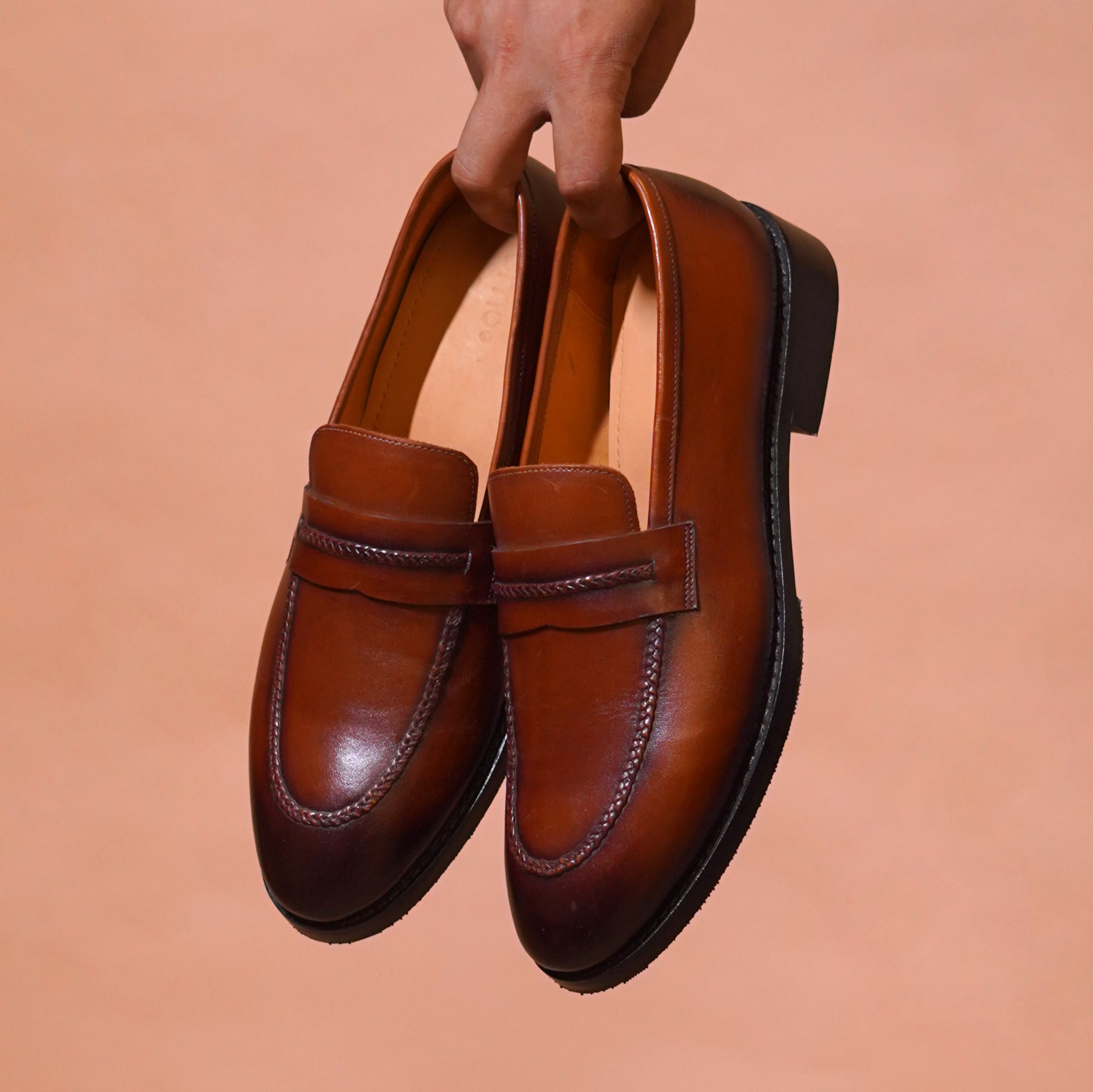 Leather sole penny loafer with woven detail