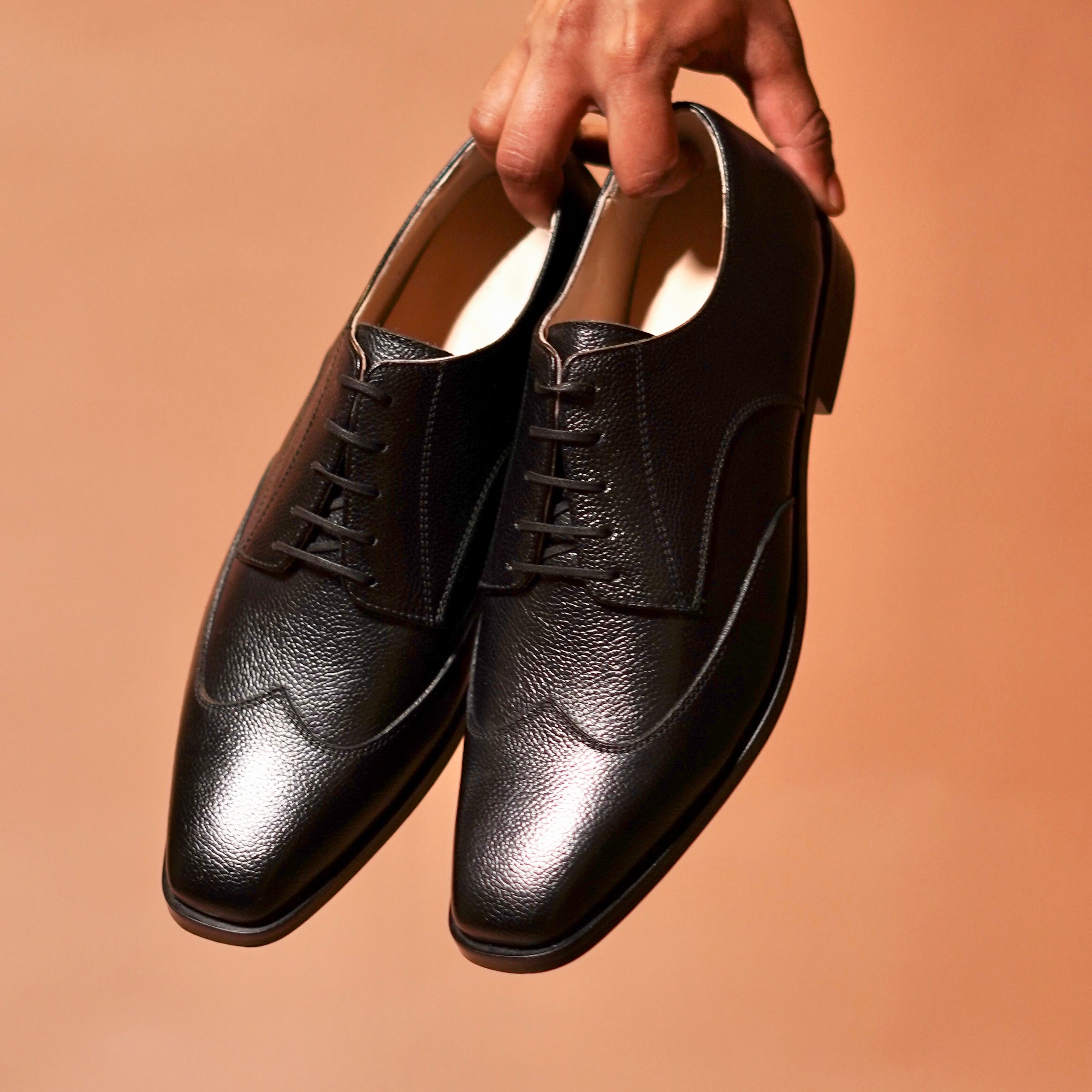 Top view of Carbo Nero with laced closure and brogue detailing