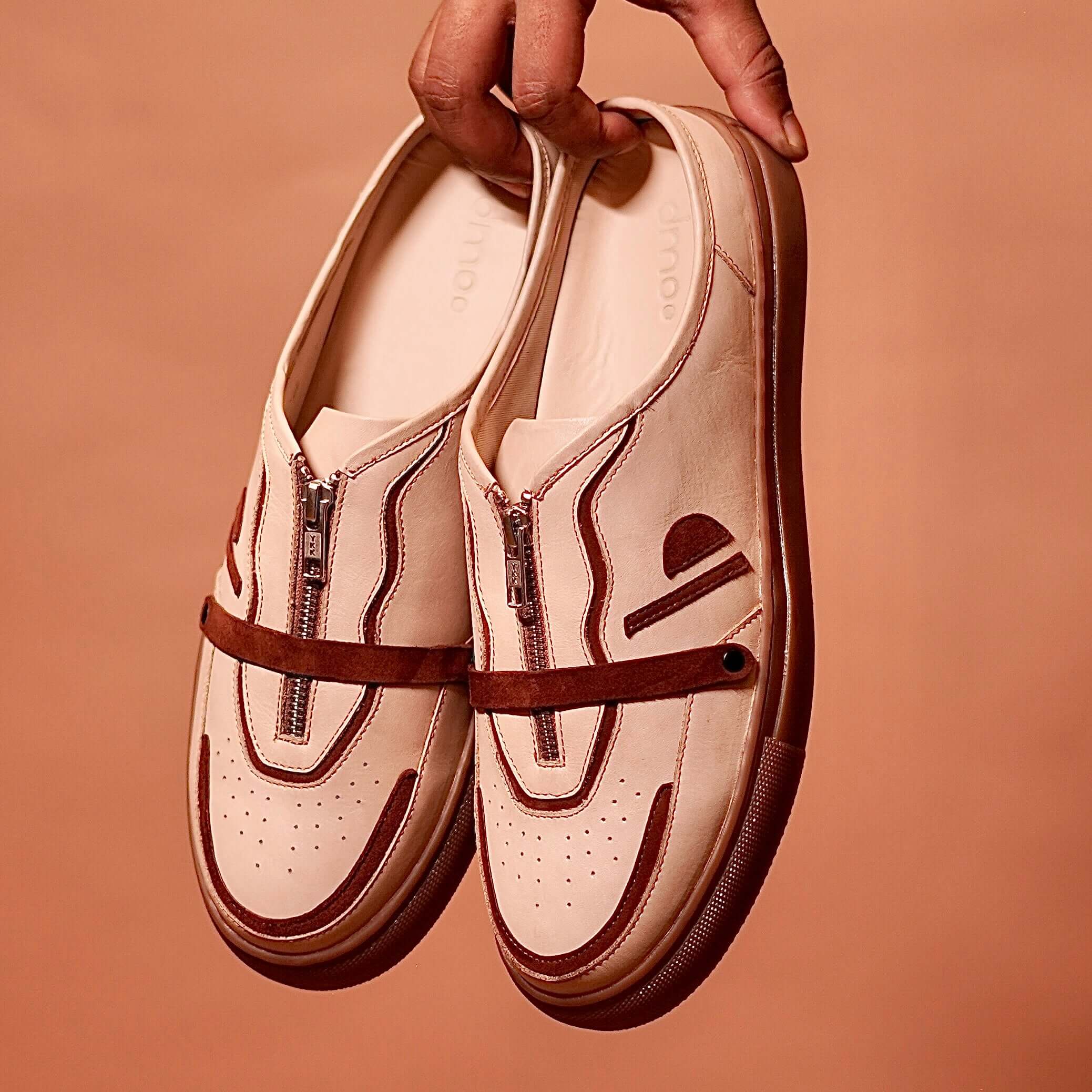 Top view of Freddo Mocha featuring front zipper and curved overlays