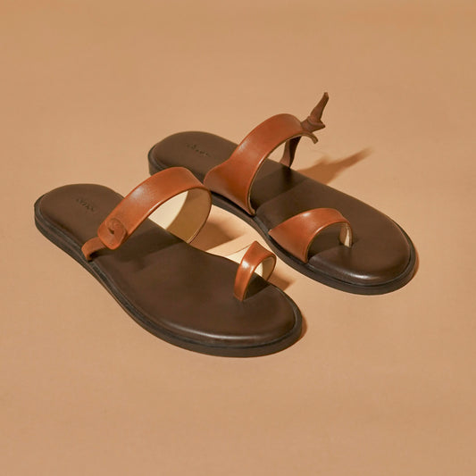 Brown sandal with toe loop