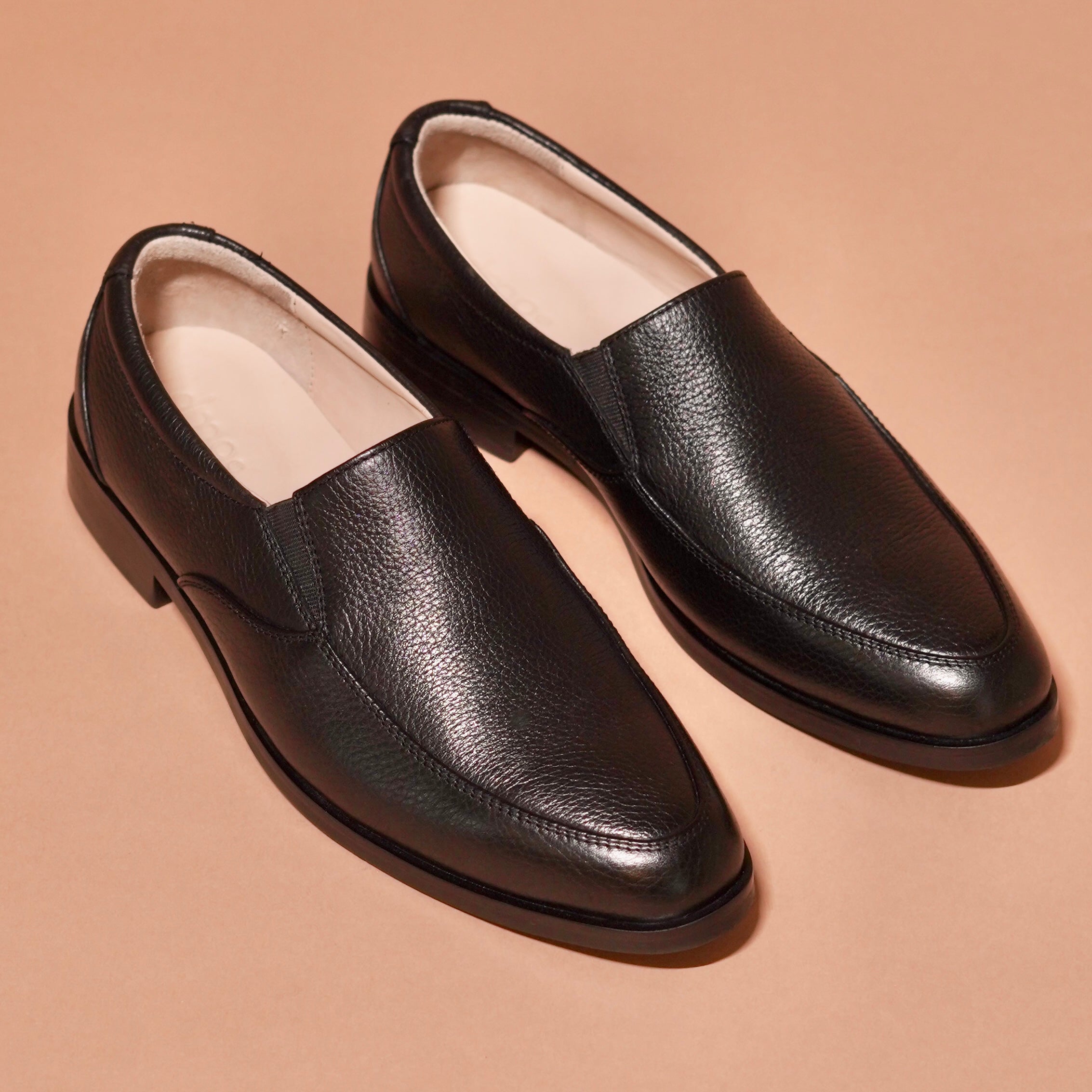 Motivo Lavaro styled with formal trousers for a polished office look