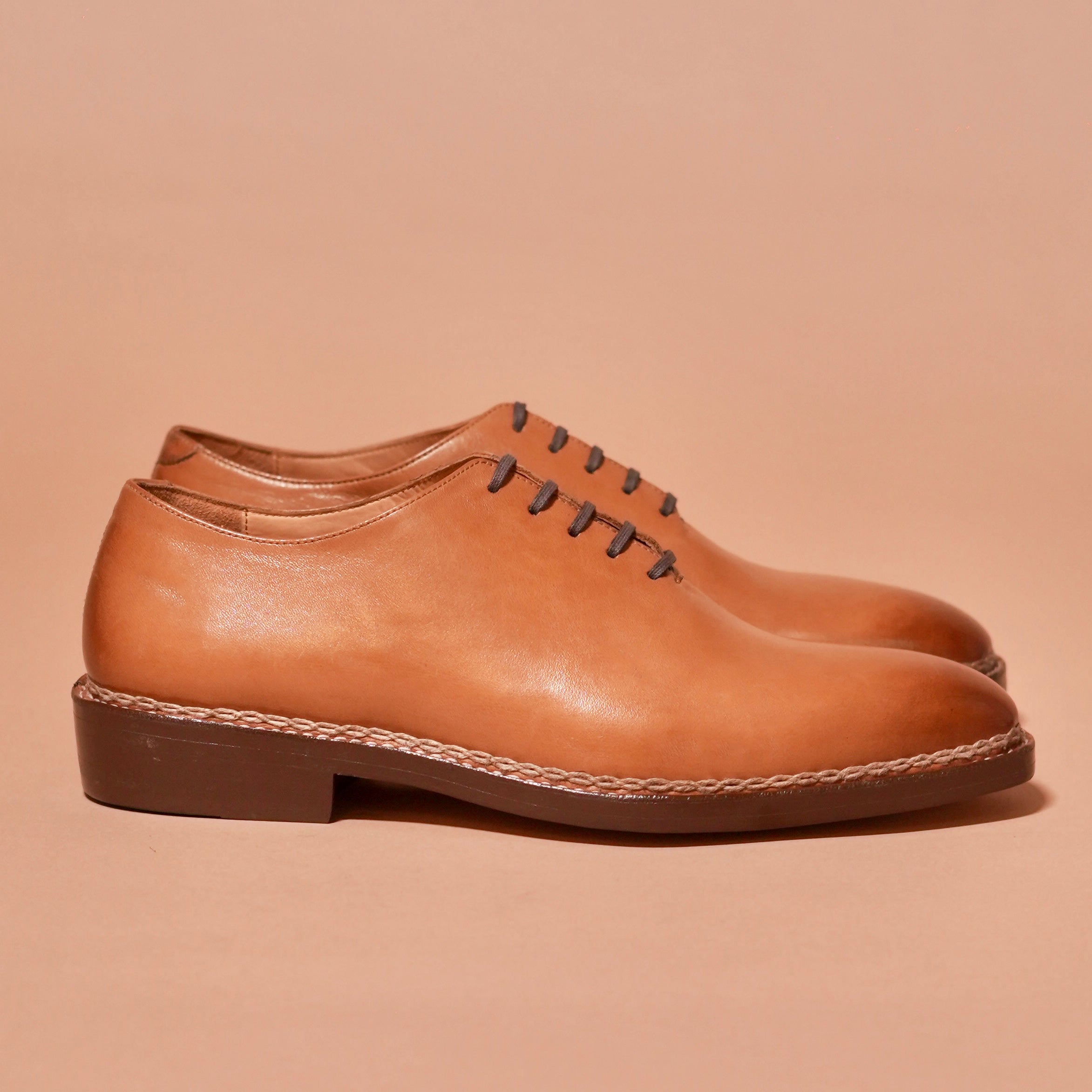 Side profile of Bruno Cuccito showing whole-cut design and side stitch