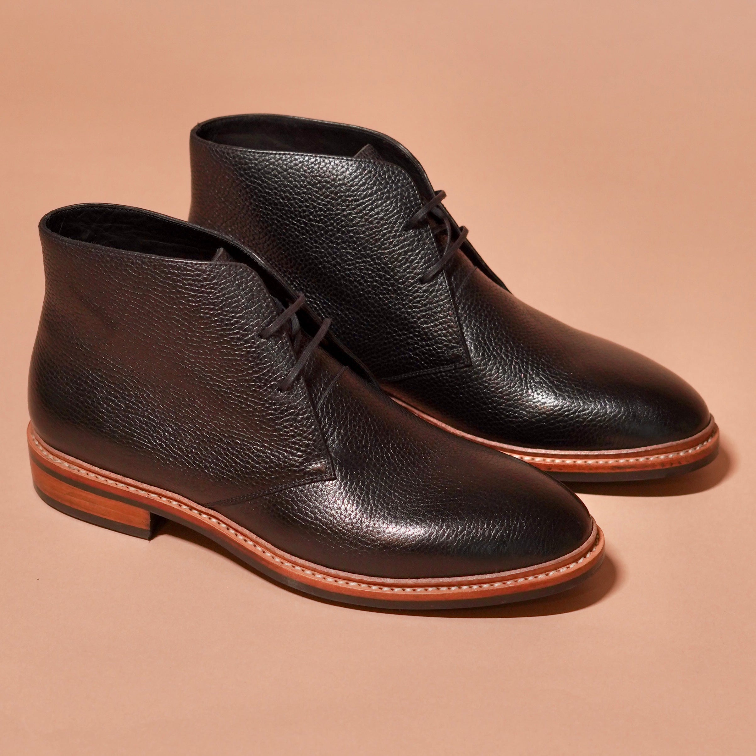 Side view of Sprazzo Welto Nero showing black leather and natural sole contrast