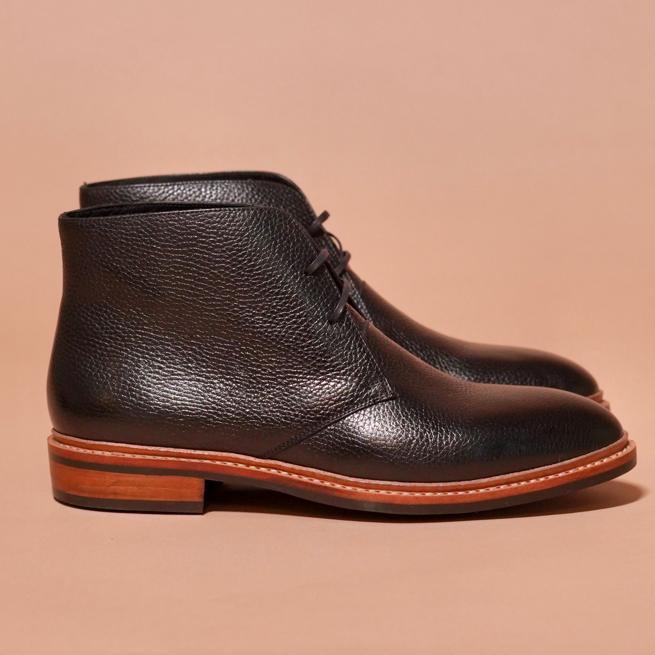 Side view of Sprazzo Welto Nero showing black leather and natural sole contrast