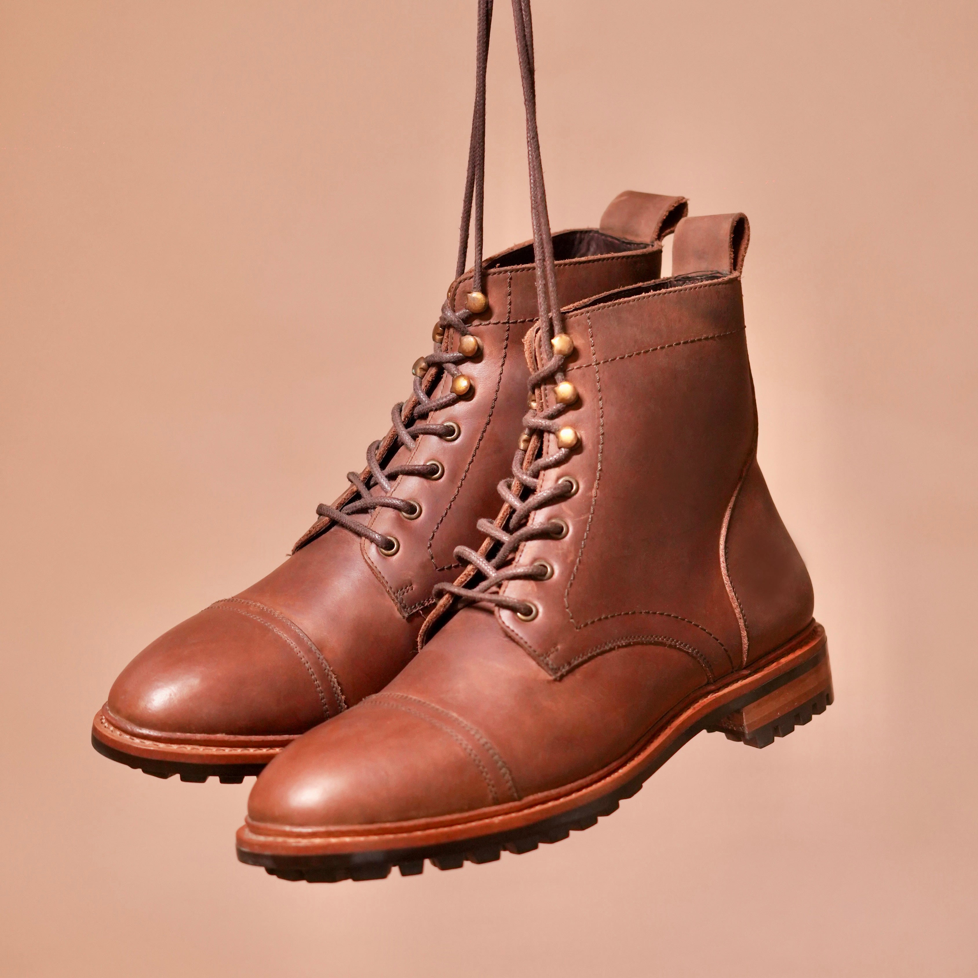 Side view of Sprazzo Welto Chocro boot showcasing cap toe and rugged leather texture