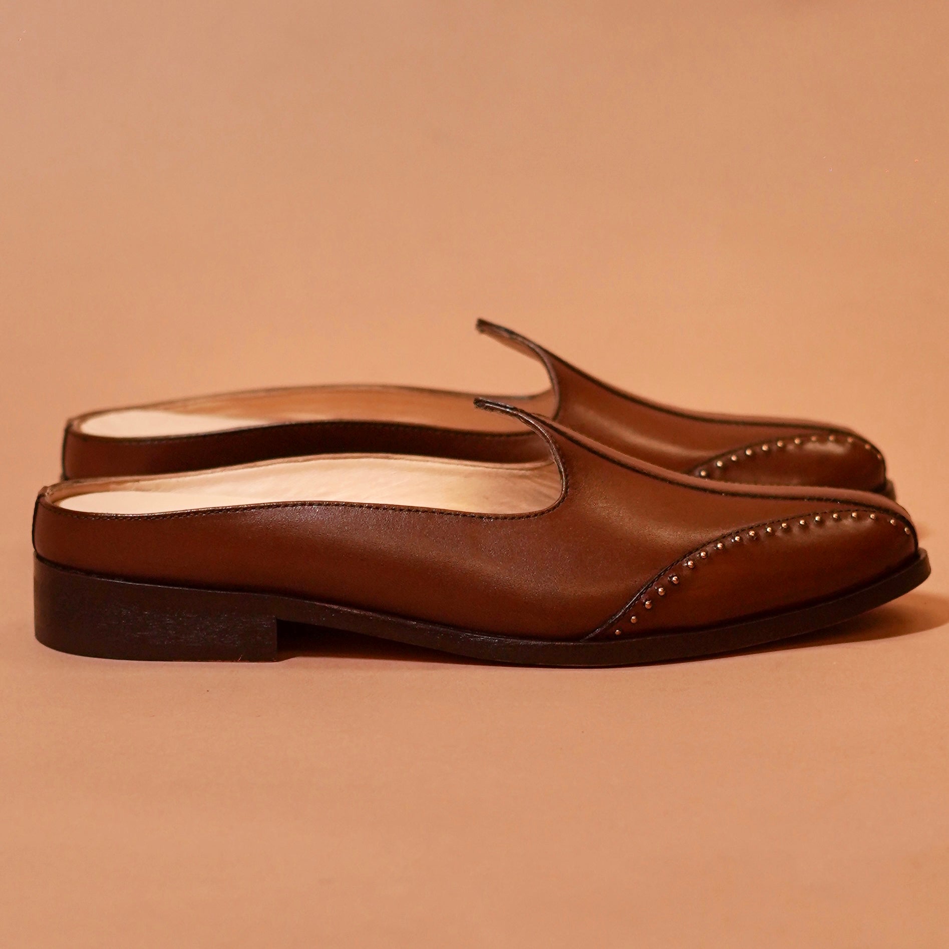 Rivet detail on leather upper