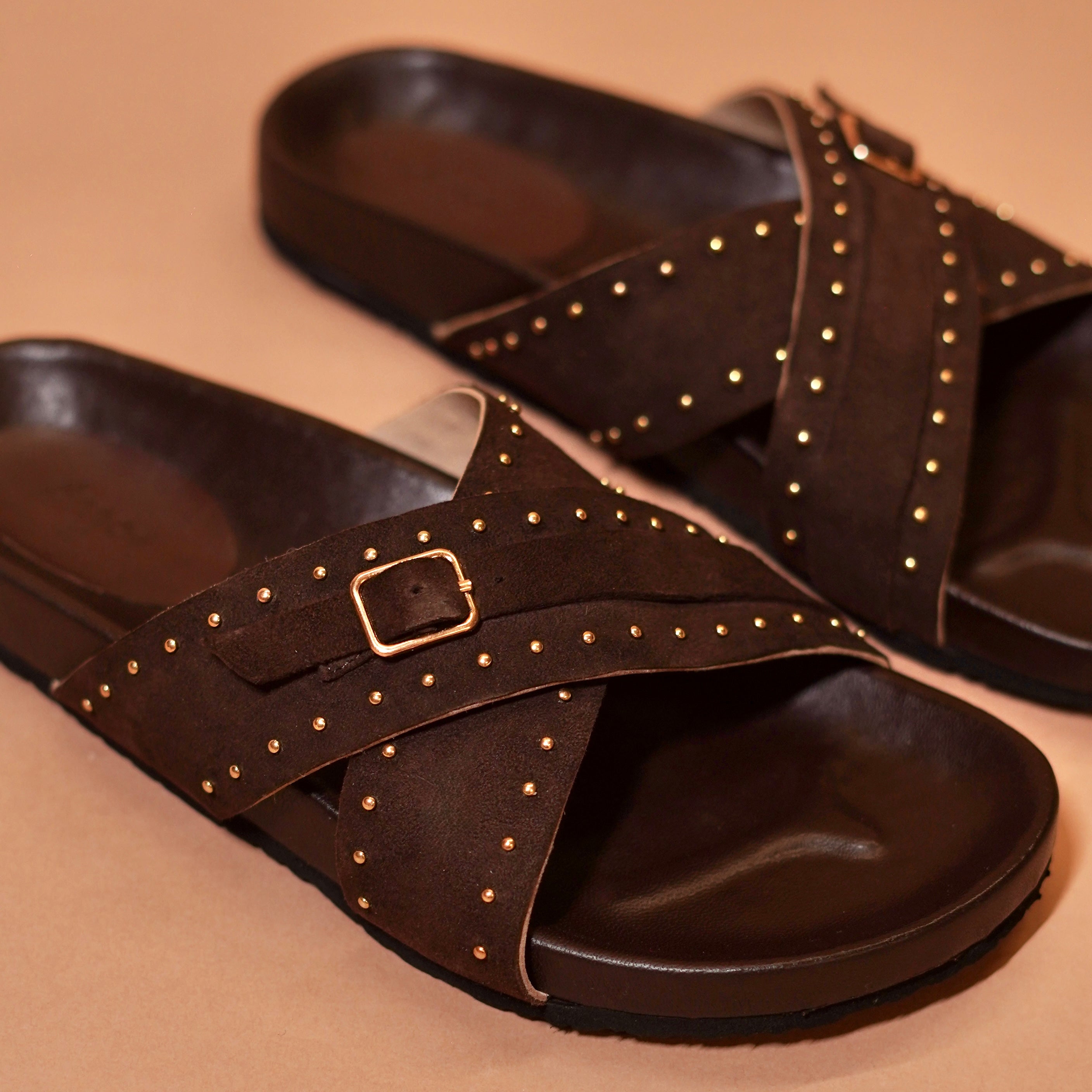 Close-up of suede and rivets