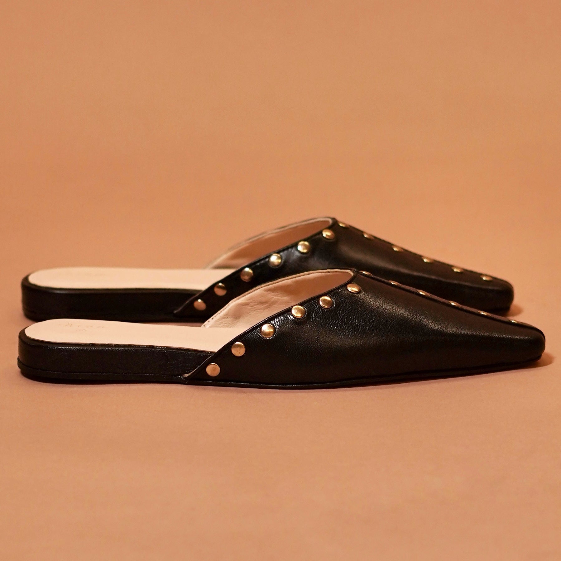 Rivet detail mule design