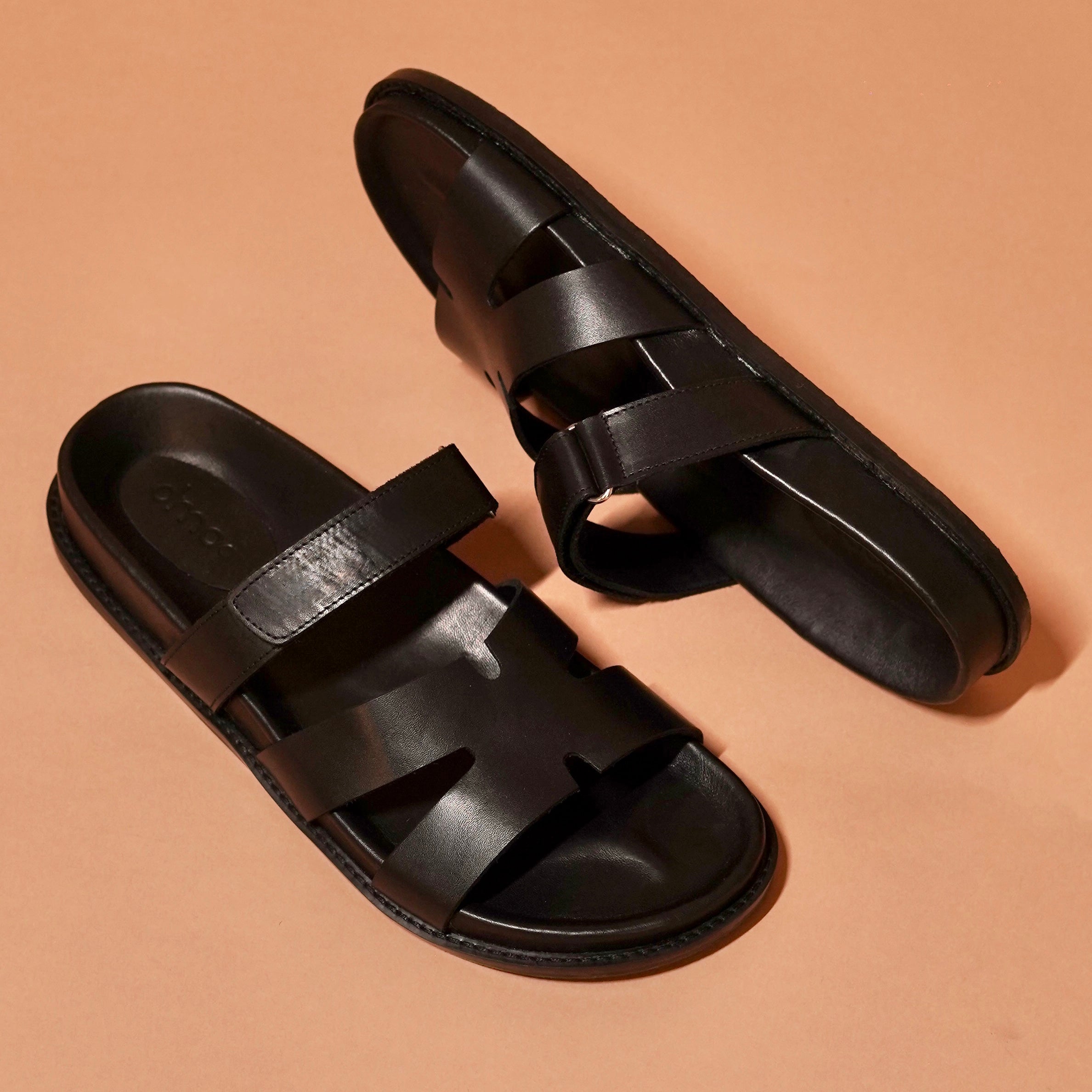 Close-up of cushioned footbed and leather strap on Pelle Corko Carbonio