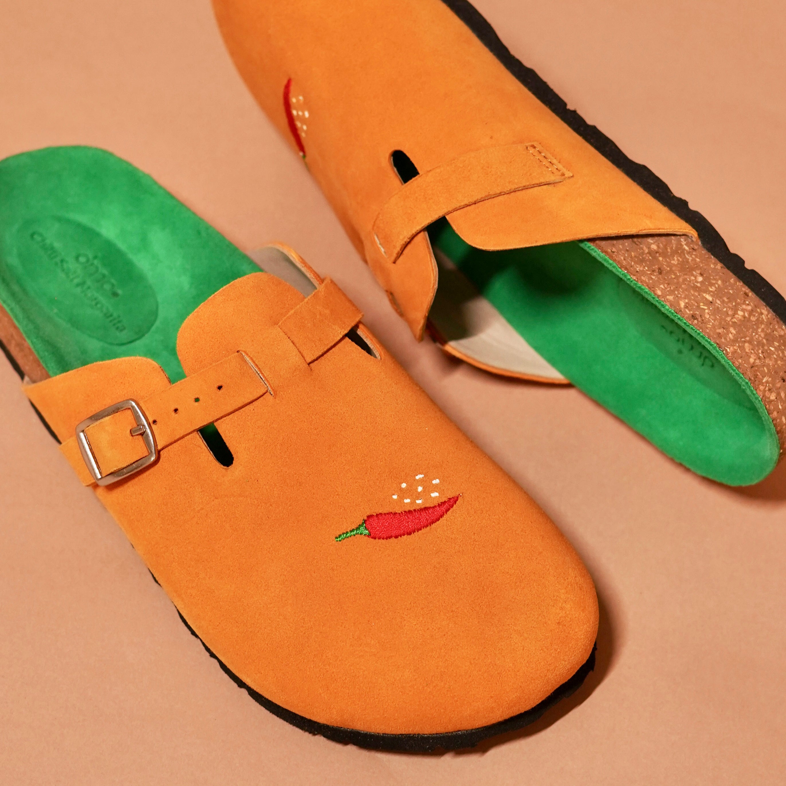 Top angle of Tangerine Mule highlighting cork sole and relaxed silhouette