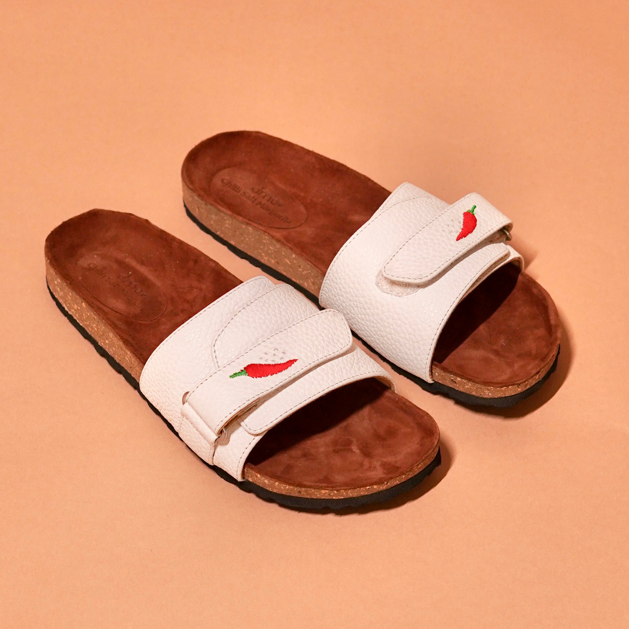 Close-up of ergonomic footbed and suede insole on Salt Slider