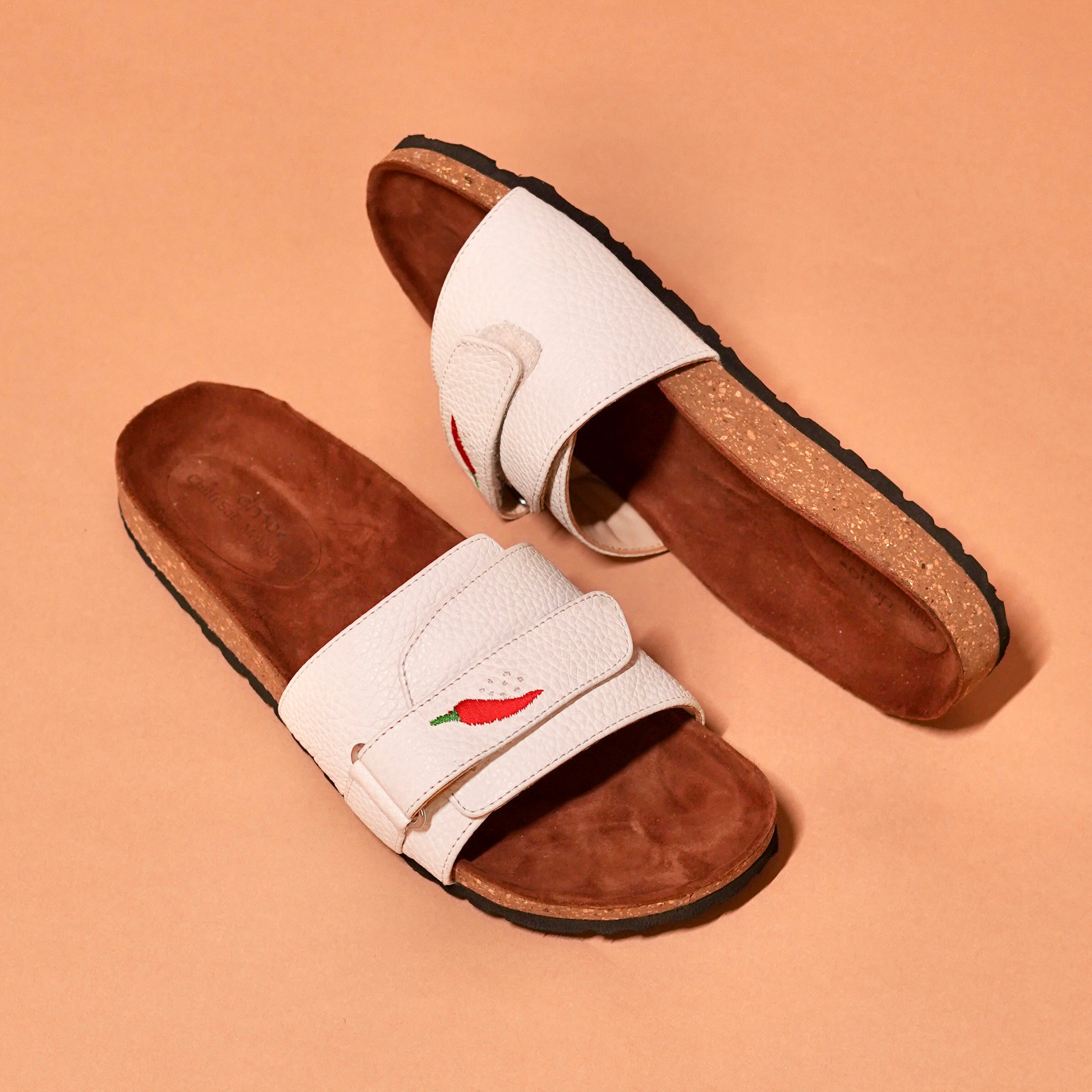 Top angle of Salt Slider highlighting velcro strap and cork base