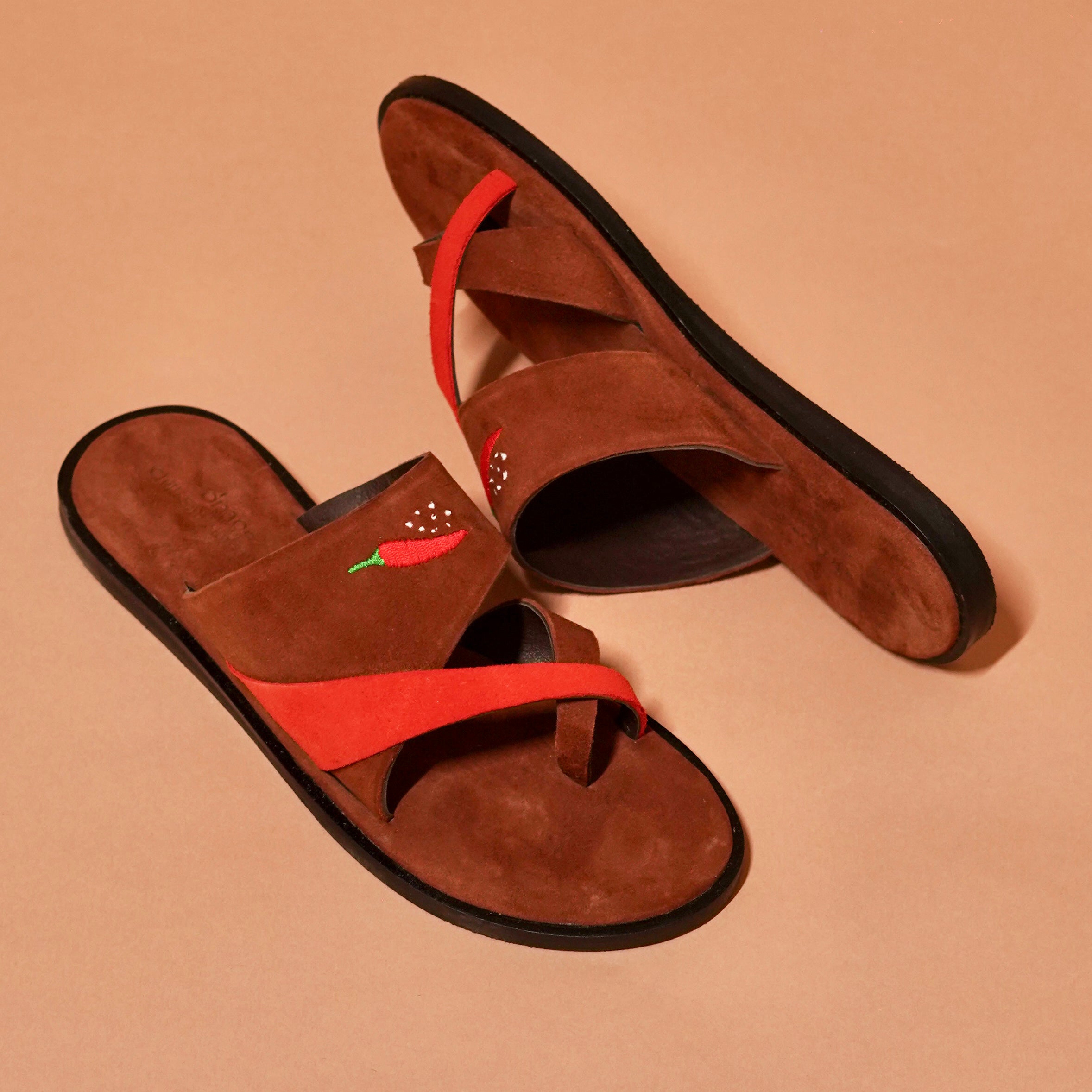 Top view of Chilli Slipper with brown and red suede straps and toe loop