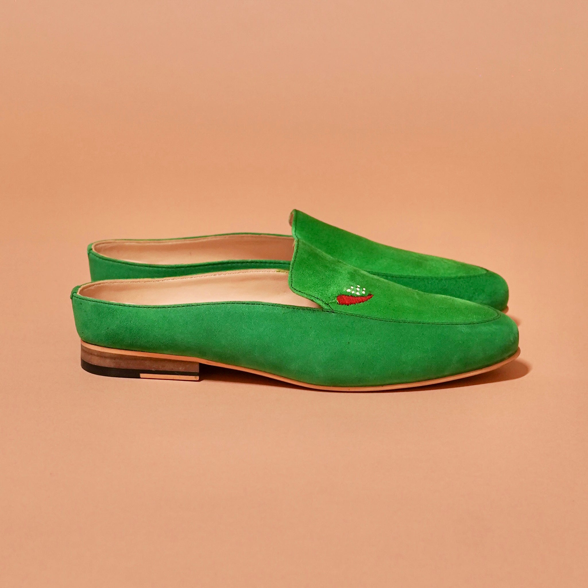 Side view of Margarita Mule showing backless silhouette and soft lining