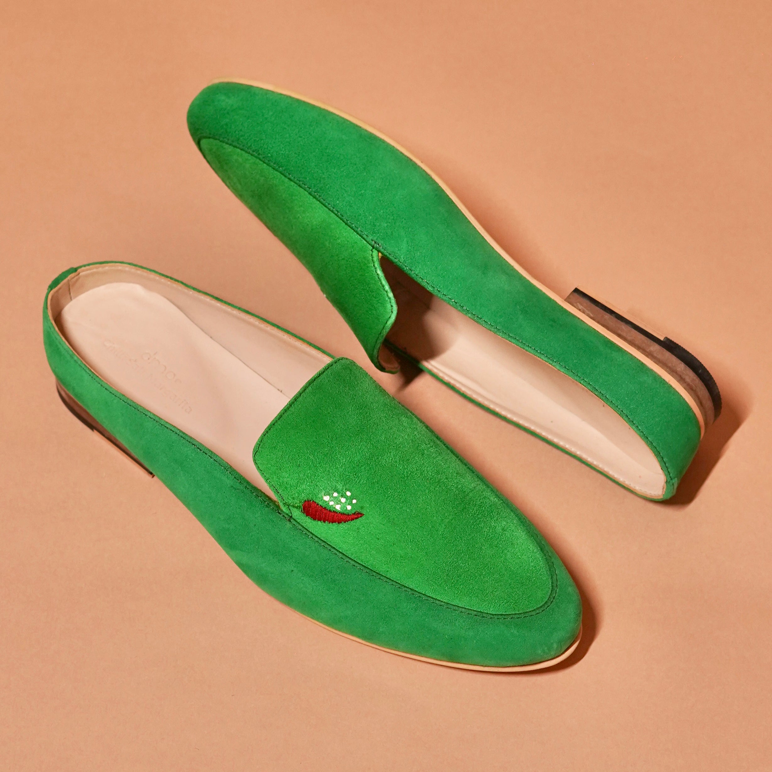 Top view of Margarita Mule in green suede with chilli embroidery