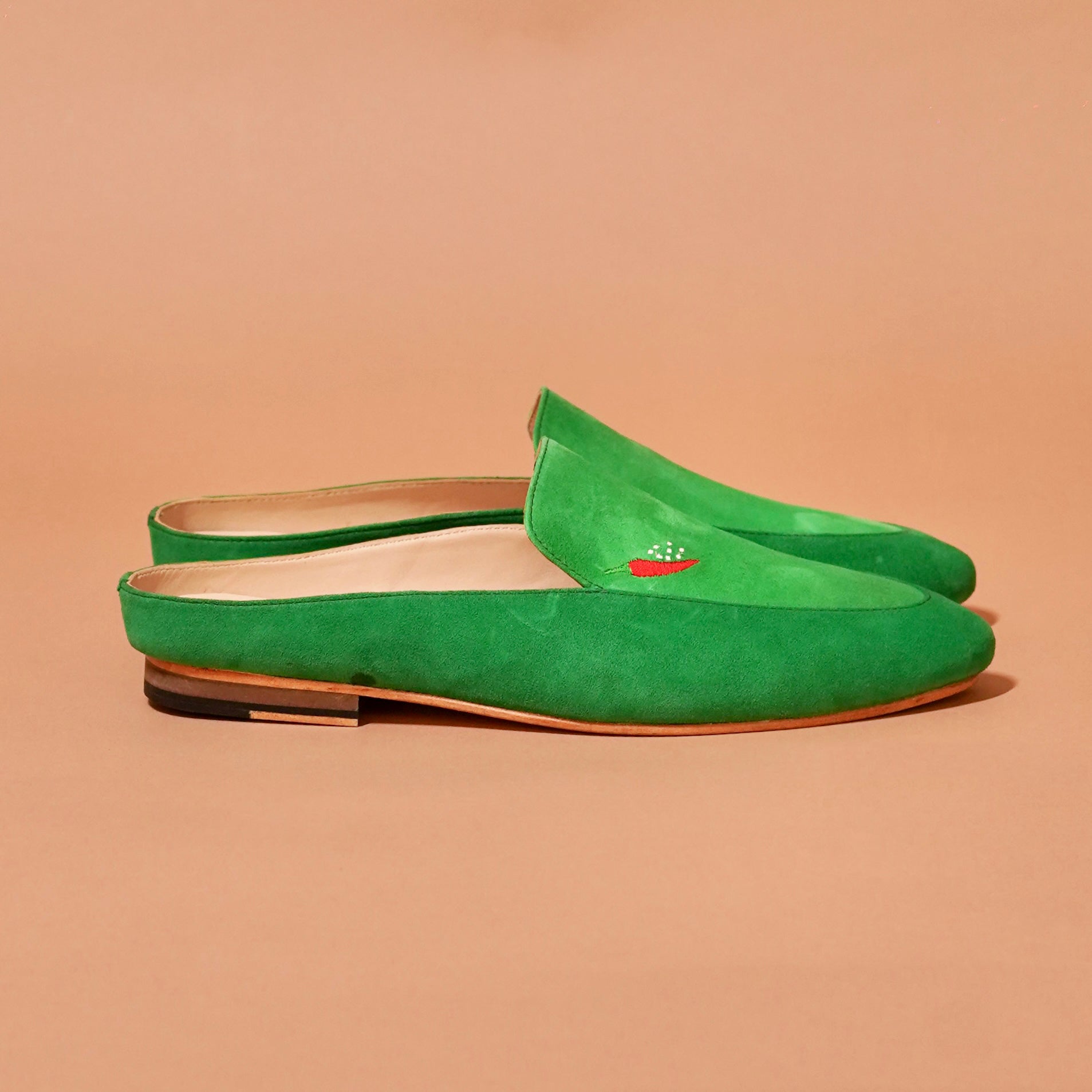 Side view of Margarita Mule showing backless silhouette and soft lining