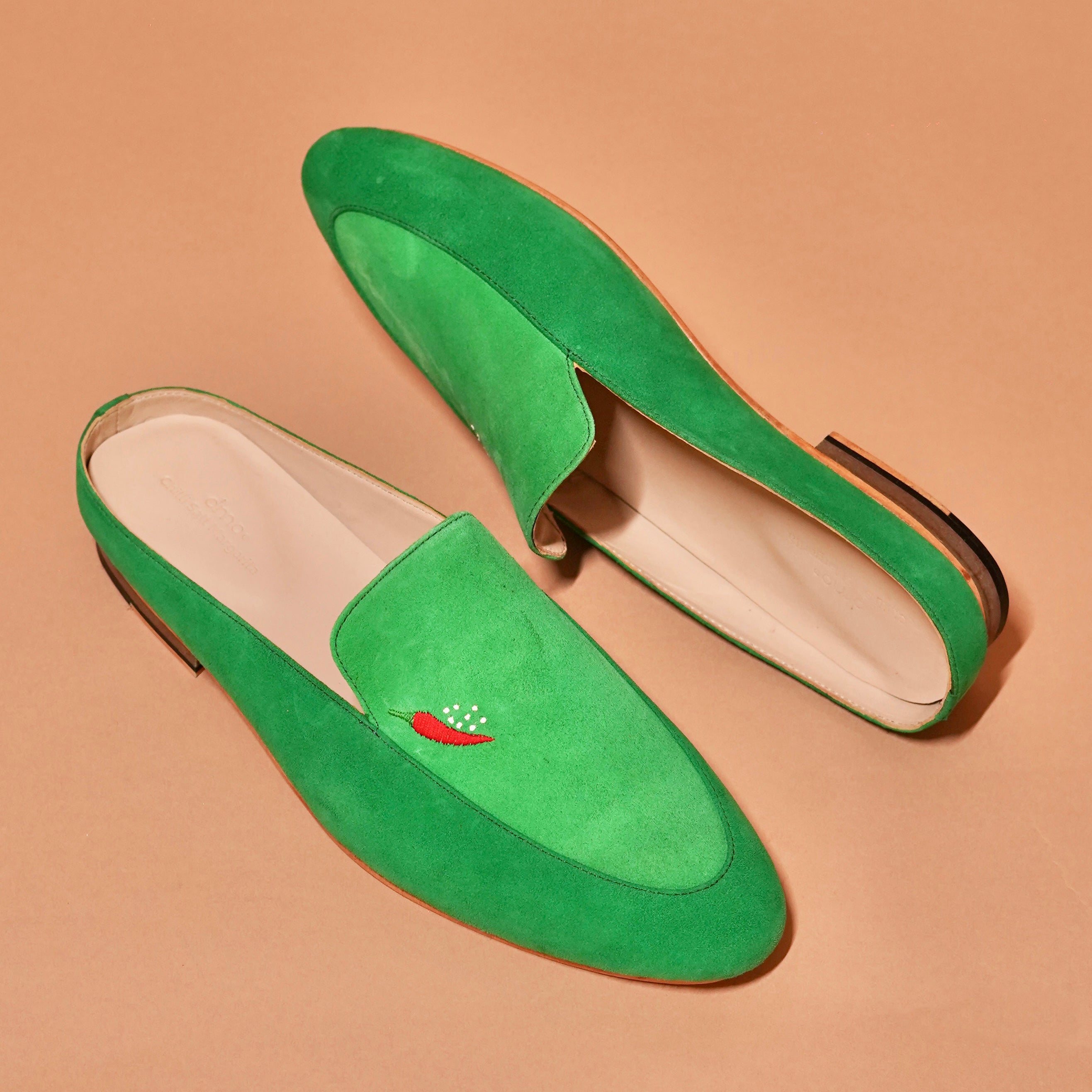 Top view of Margarita Mule in green suede with chilli embroidery