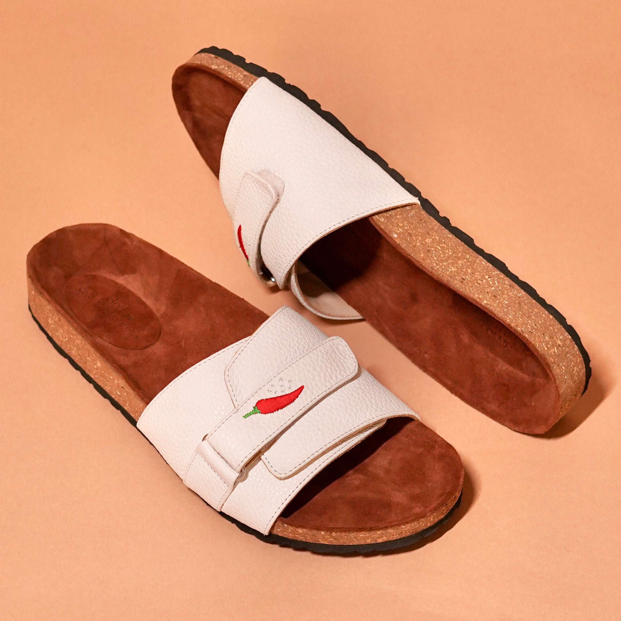 Top angle of Salt Slider highlighting velcro strap and cork base