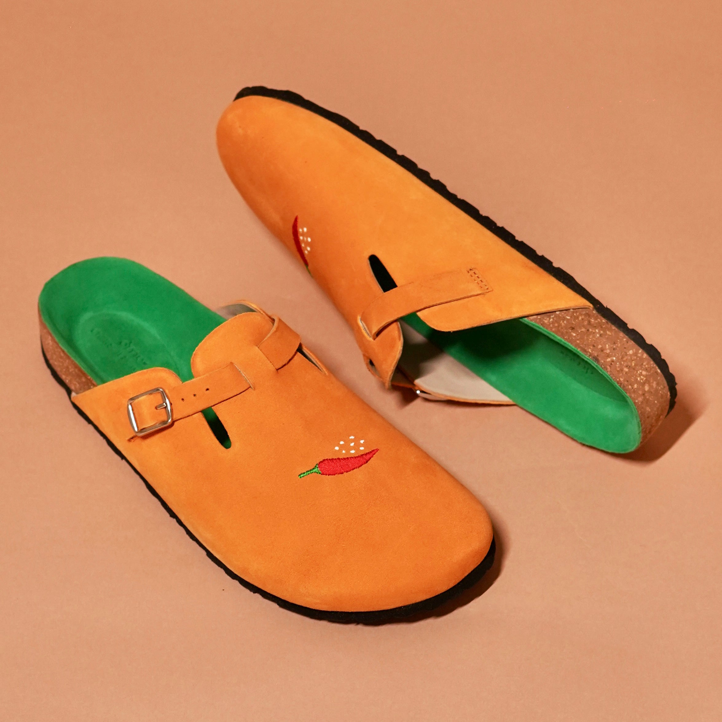 Top angle of Tangerine Mule highlighting cork sole and relaxed silhouette