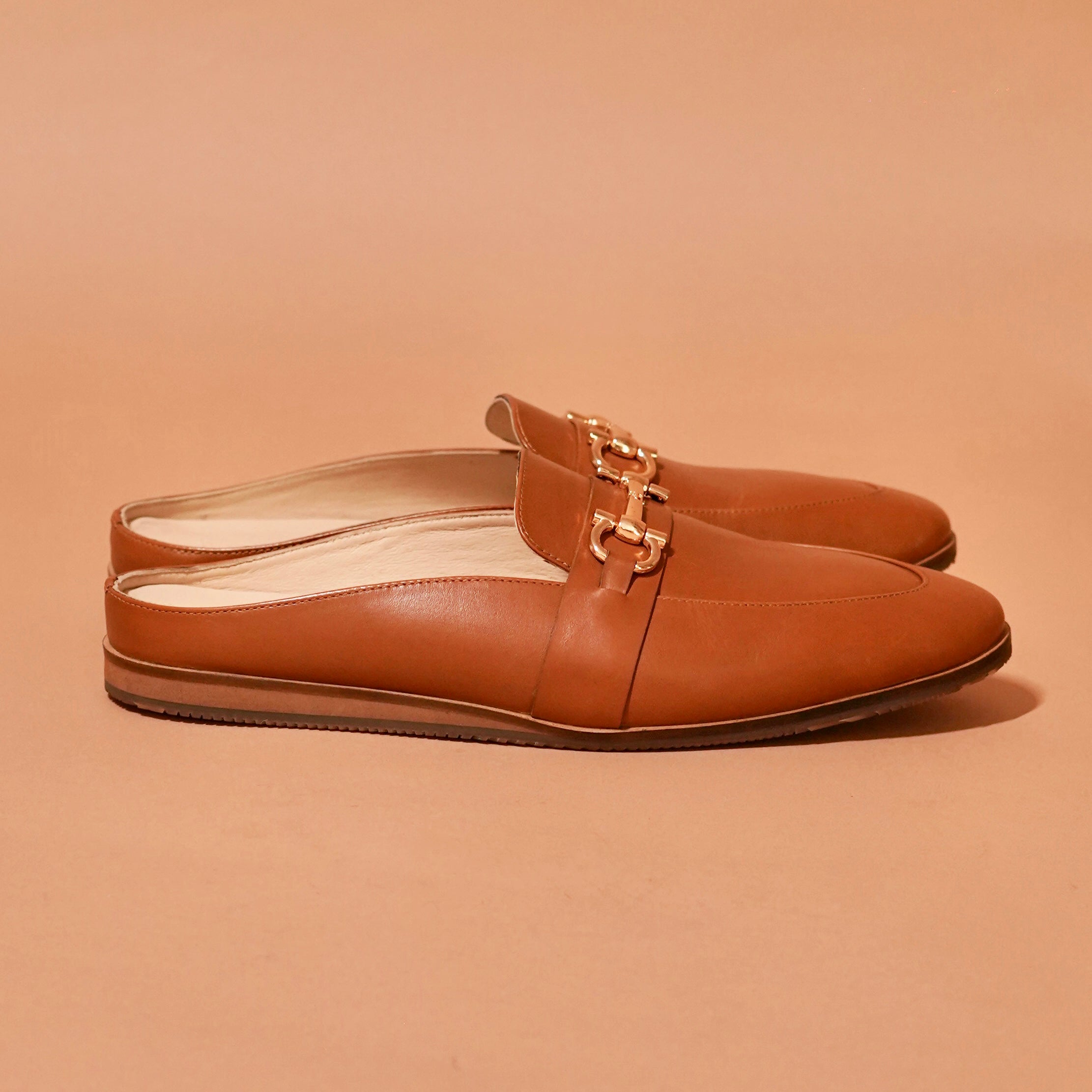 Side view of Hoffler Fibio Marrone showing golden horsebit buckle and tan leather