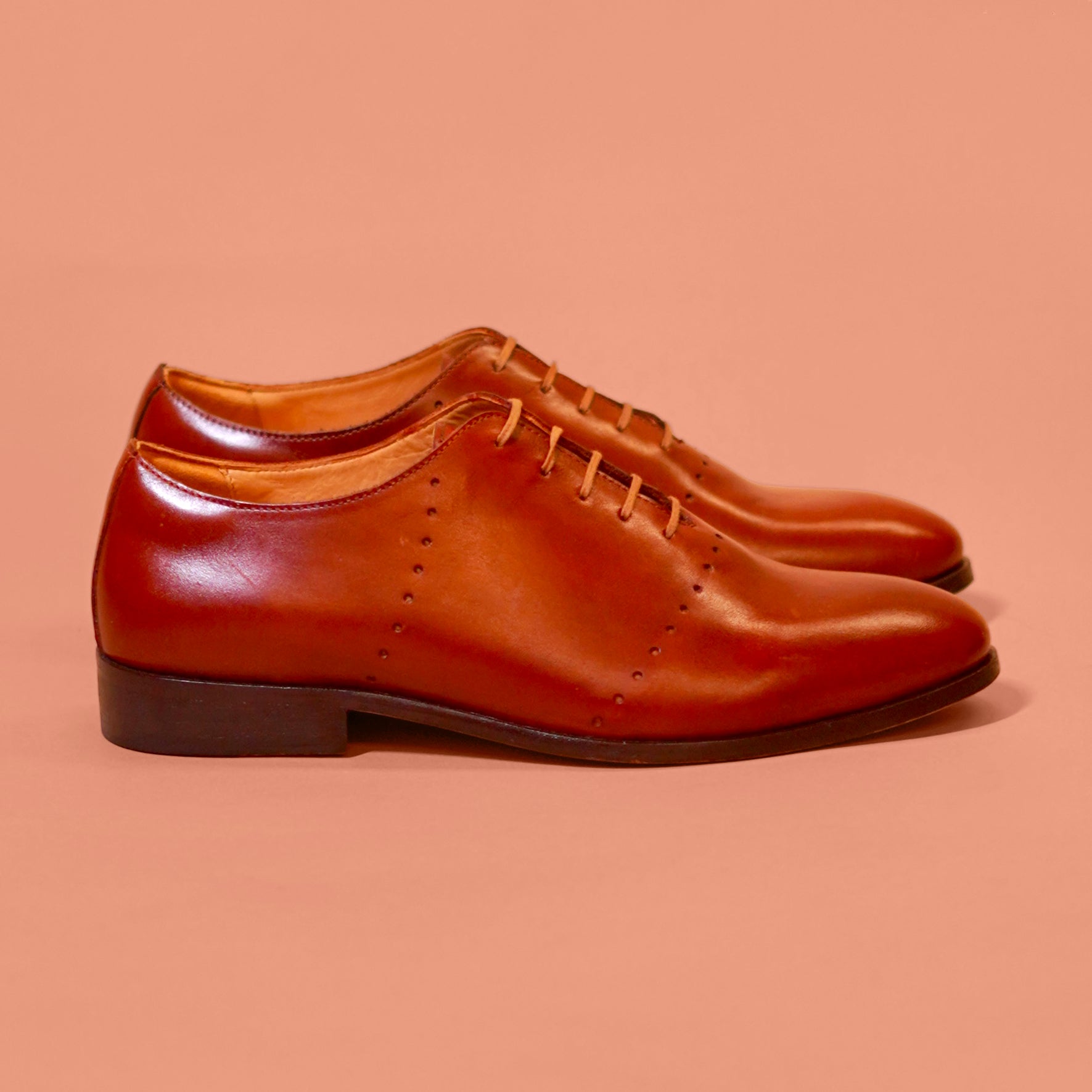 Netto | Dark Tan leather Oxfords with minimal detail