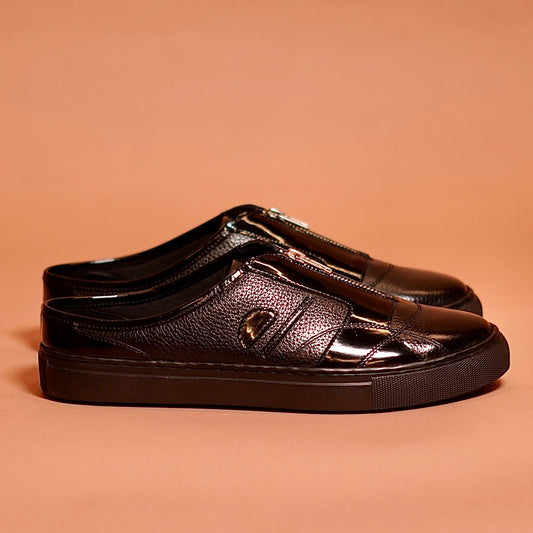 Side profile of Freddo Lustro black mule sneaker with zip