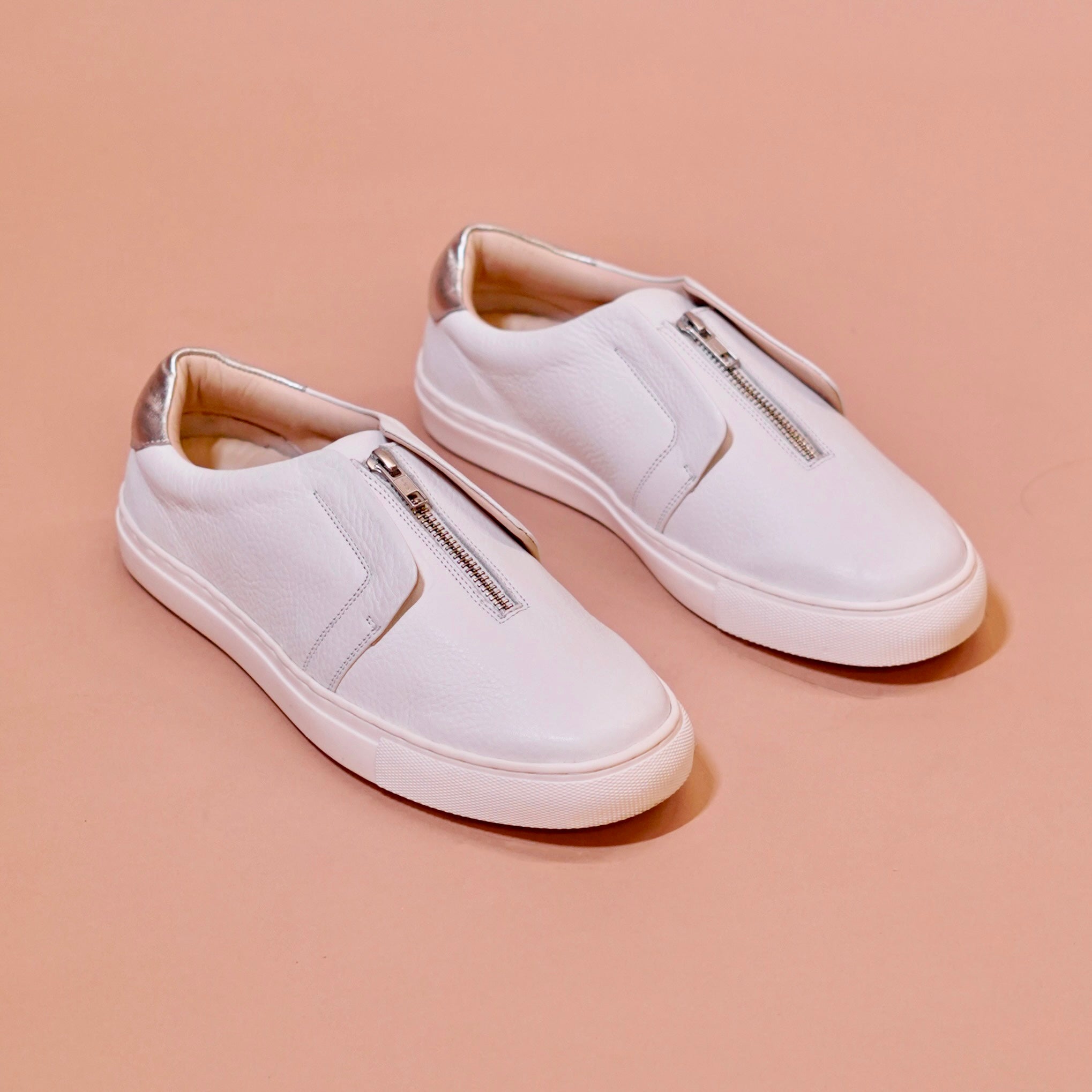 Pigro Bianco | White zip-up leather sneakers