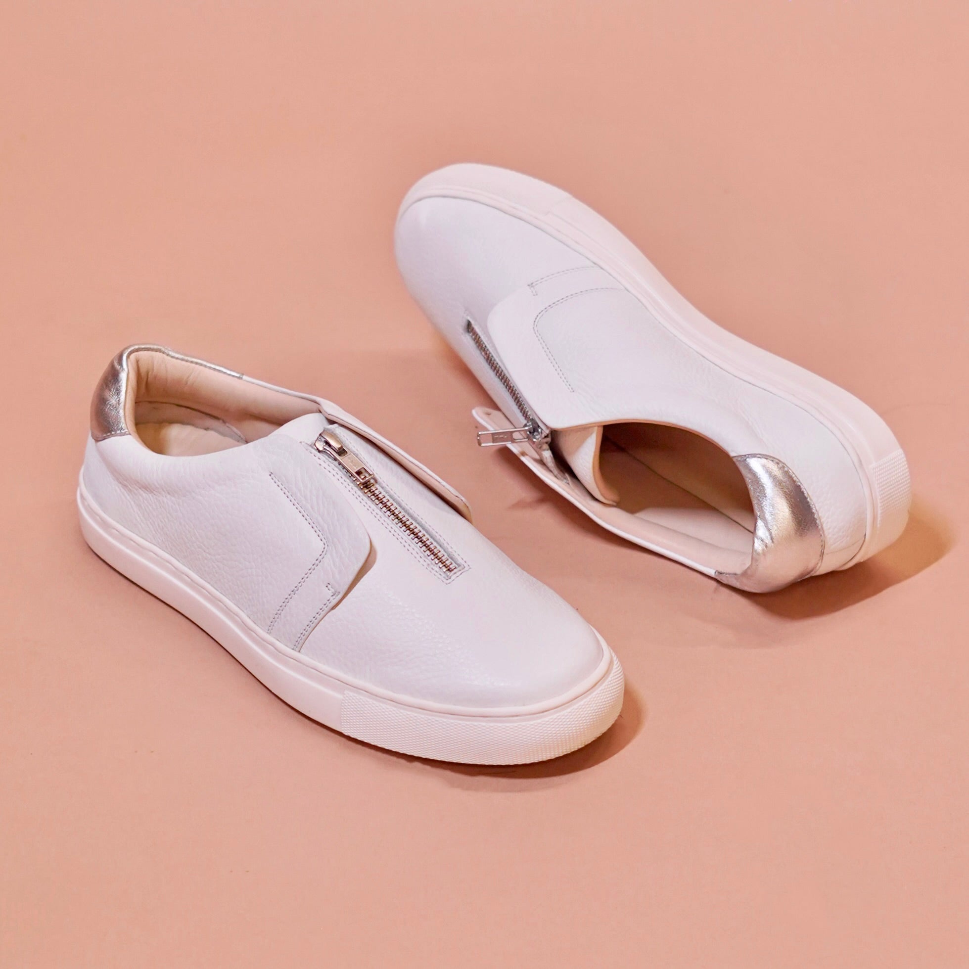 Pigro Bianco | White zip-up leather sneakers
