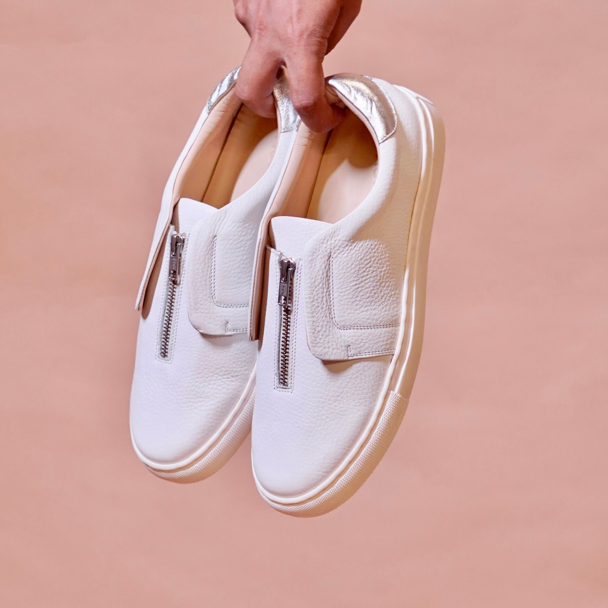 Pigro Bianco | White zip-up leather sneakers