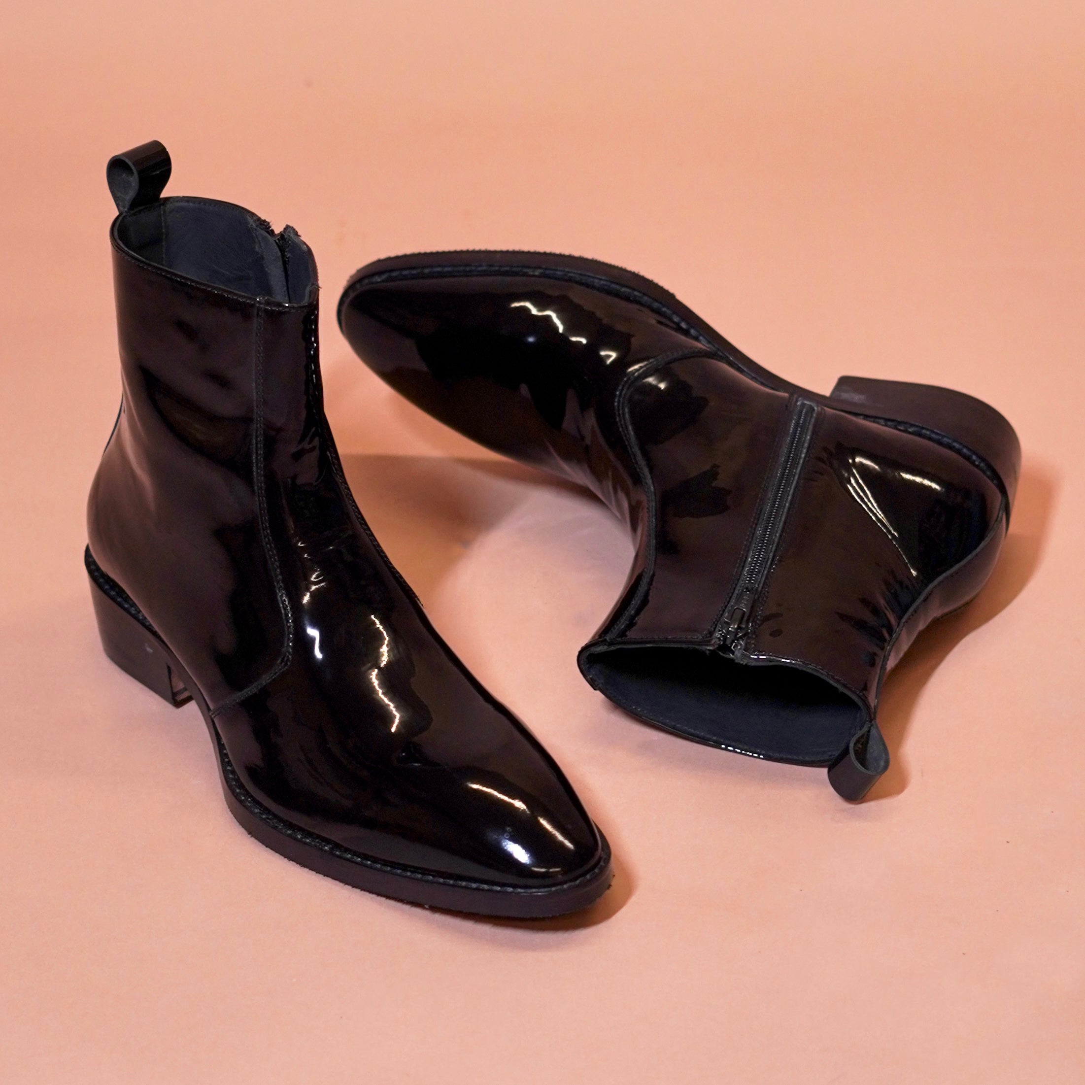 Close-up of patent leather finish on Sprazzo Nero Lucido men's boots